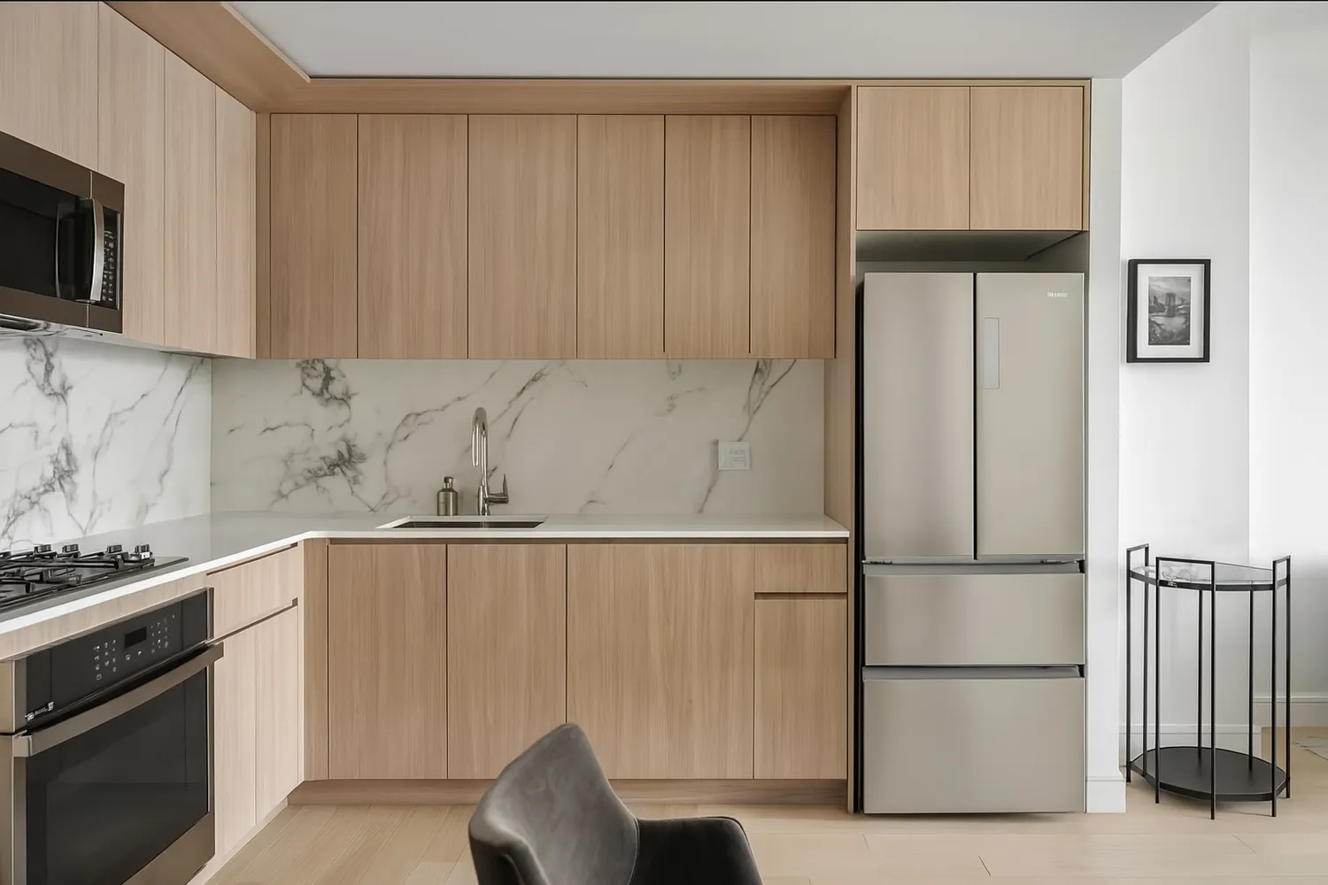 a kitchen with a refrigerator and a stove top oven