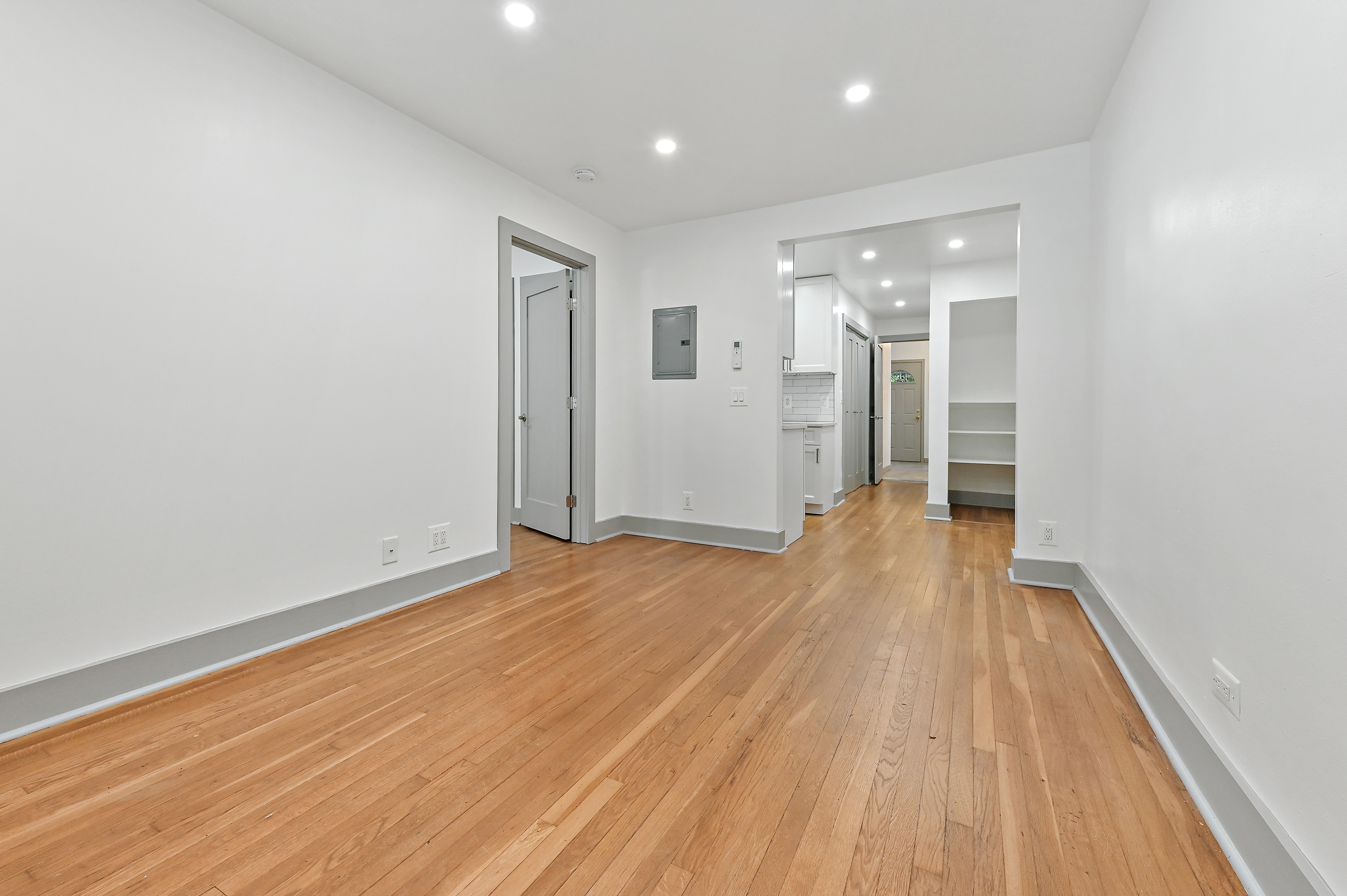 5823 Fieldston Road, Unit 1A Bronx, NY 10471 - Photo 8 of 26 a view of an empty room with wooden floor