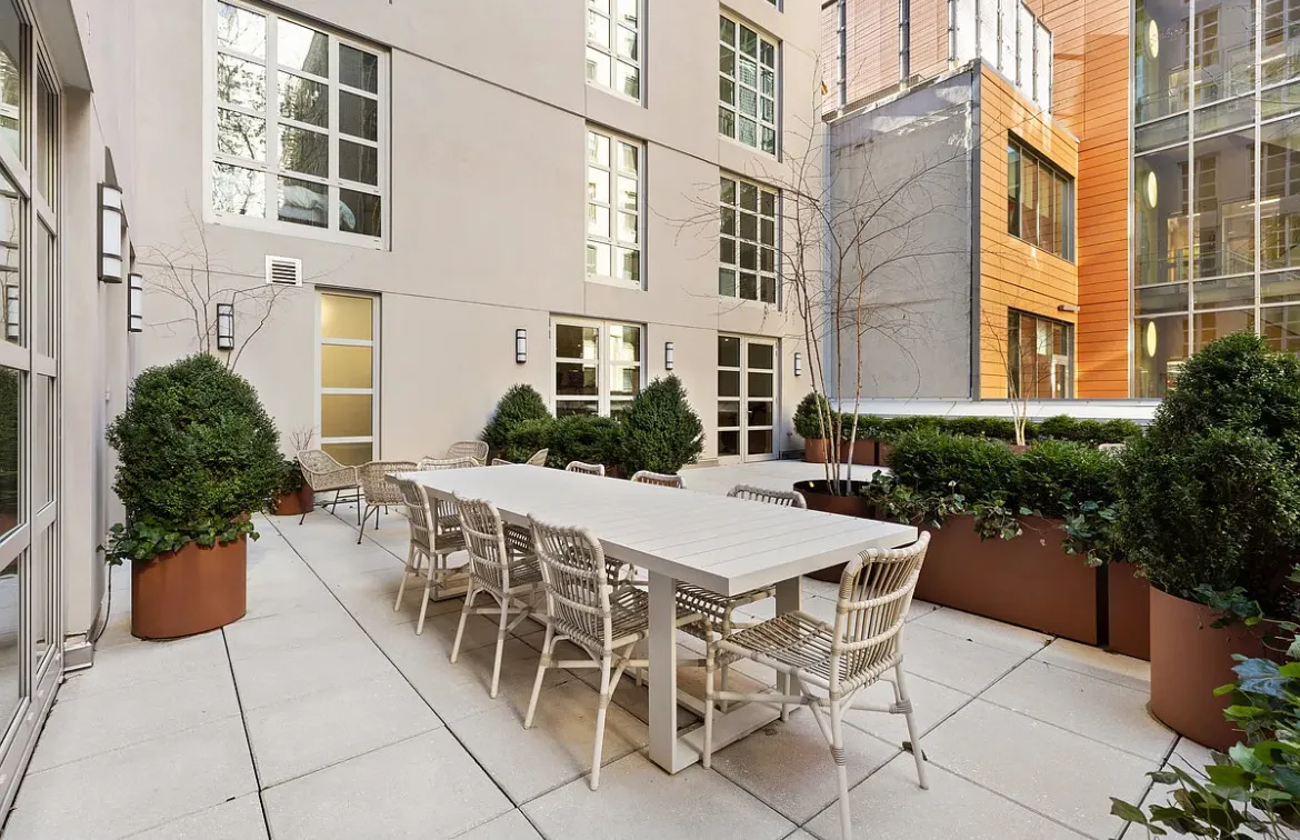 a view of a terrace with sitting area