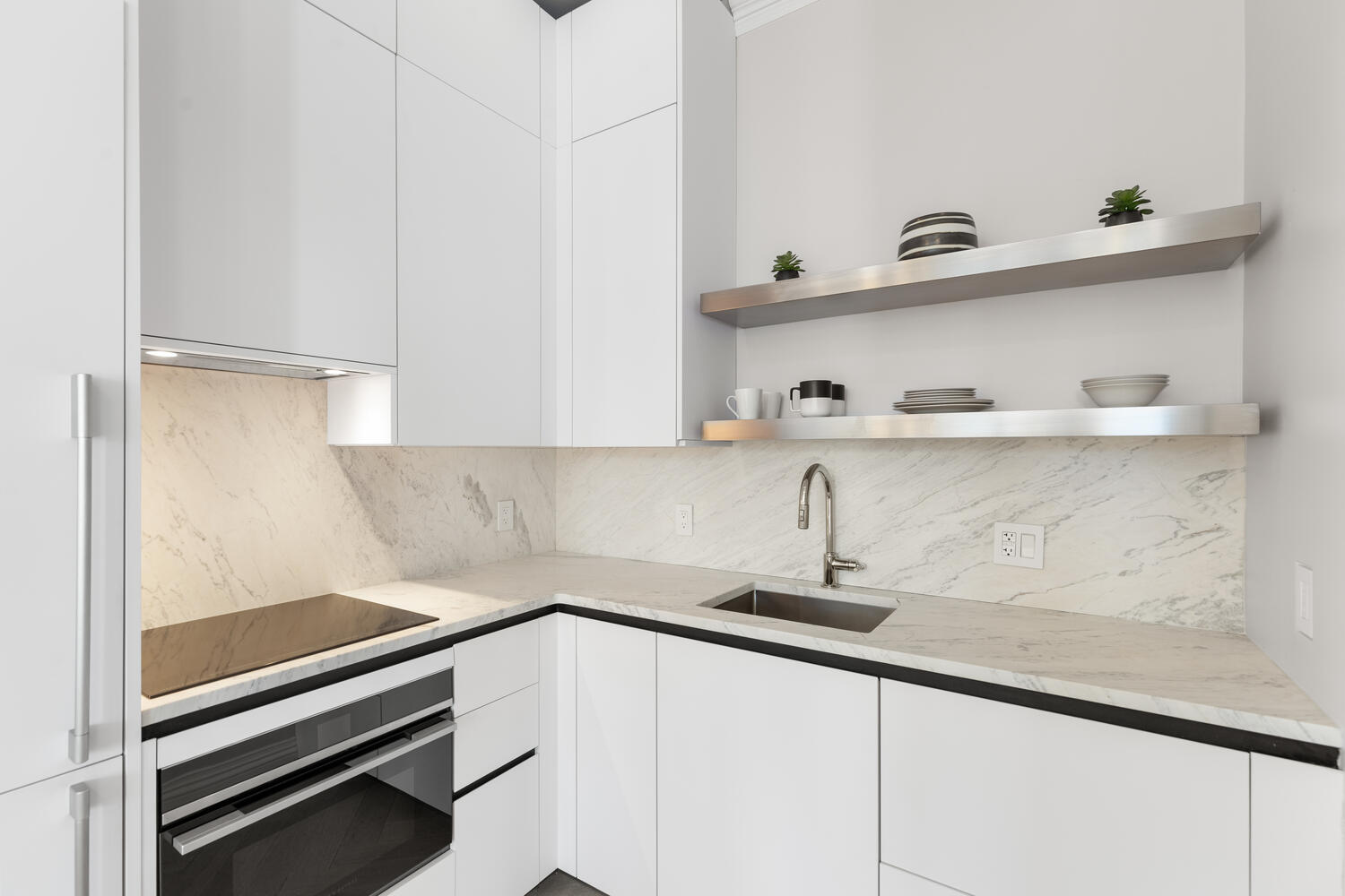 160 Commonwealth Avenue, Unit 410 Boston, MA 02116 - Photo 13 of 31 a kitchen with a sink and cabinets