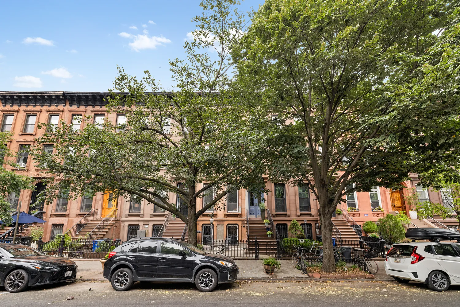 a view of car parked in front of house