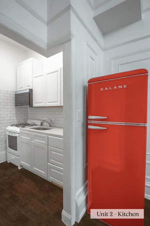 a view of a refrigerator a sink and dishwasher
