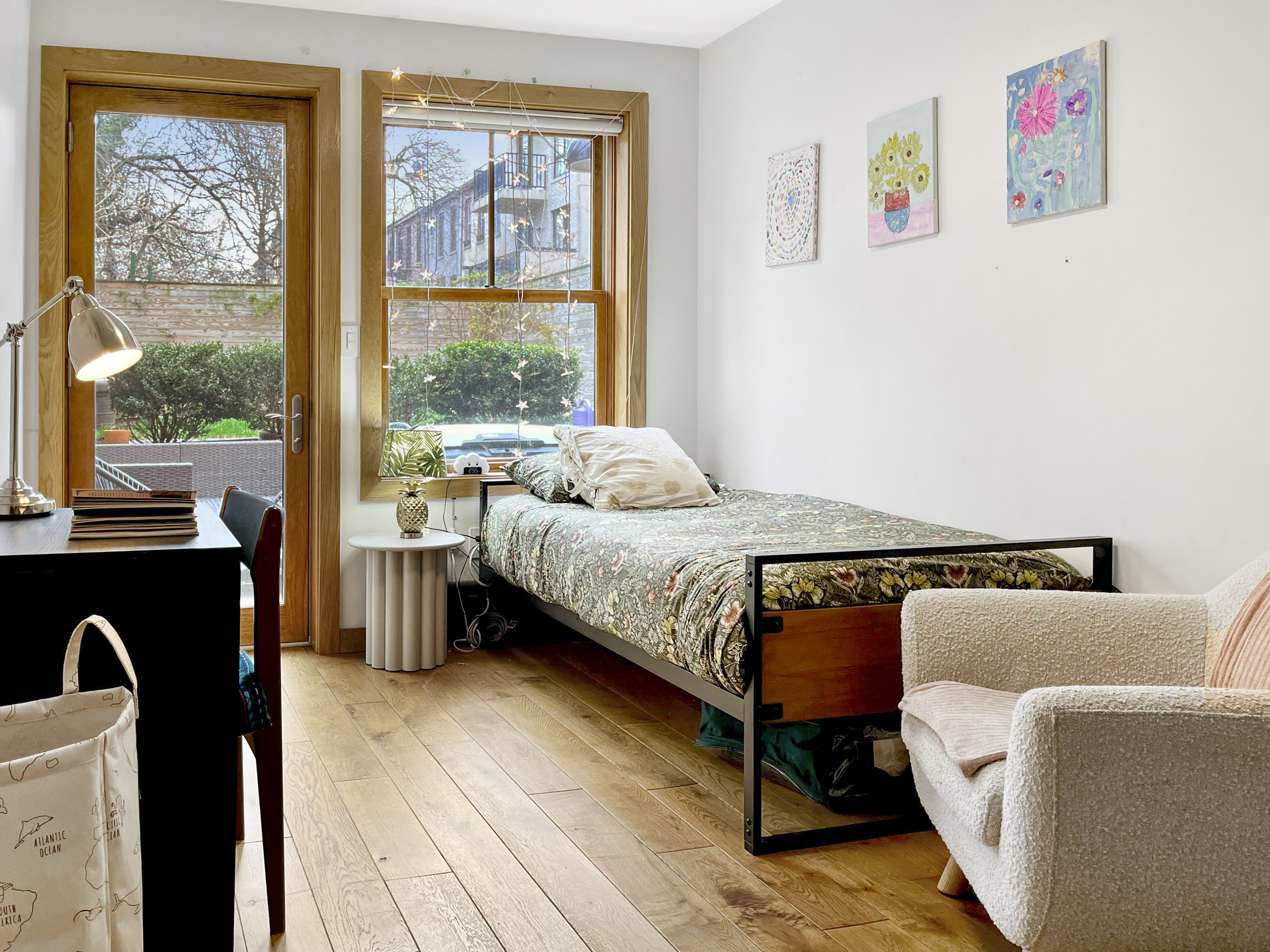 252 Stuyvesant Brooklyn, NY 11221 - Photo 13 of 18 a bedroom with a bed and a window