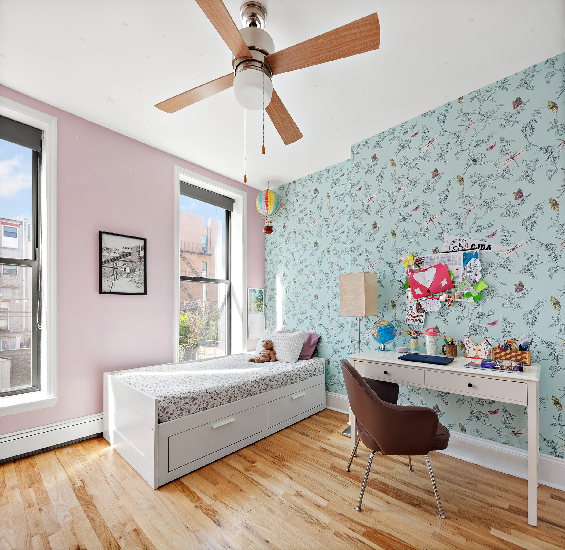 232 Monroe Street Brooklyn, NY 11216 - Photo 10 of 21 a living room with furniture and a window