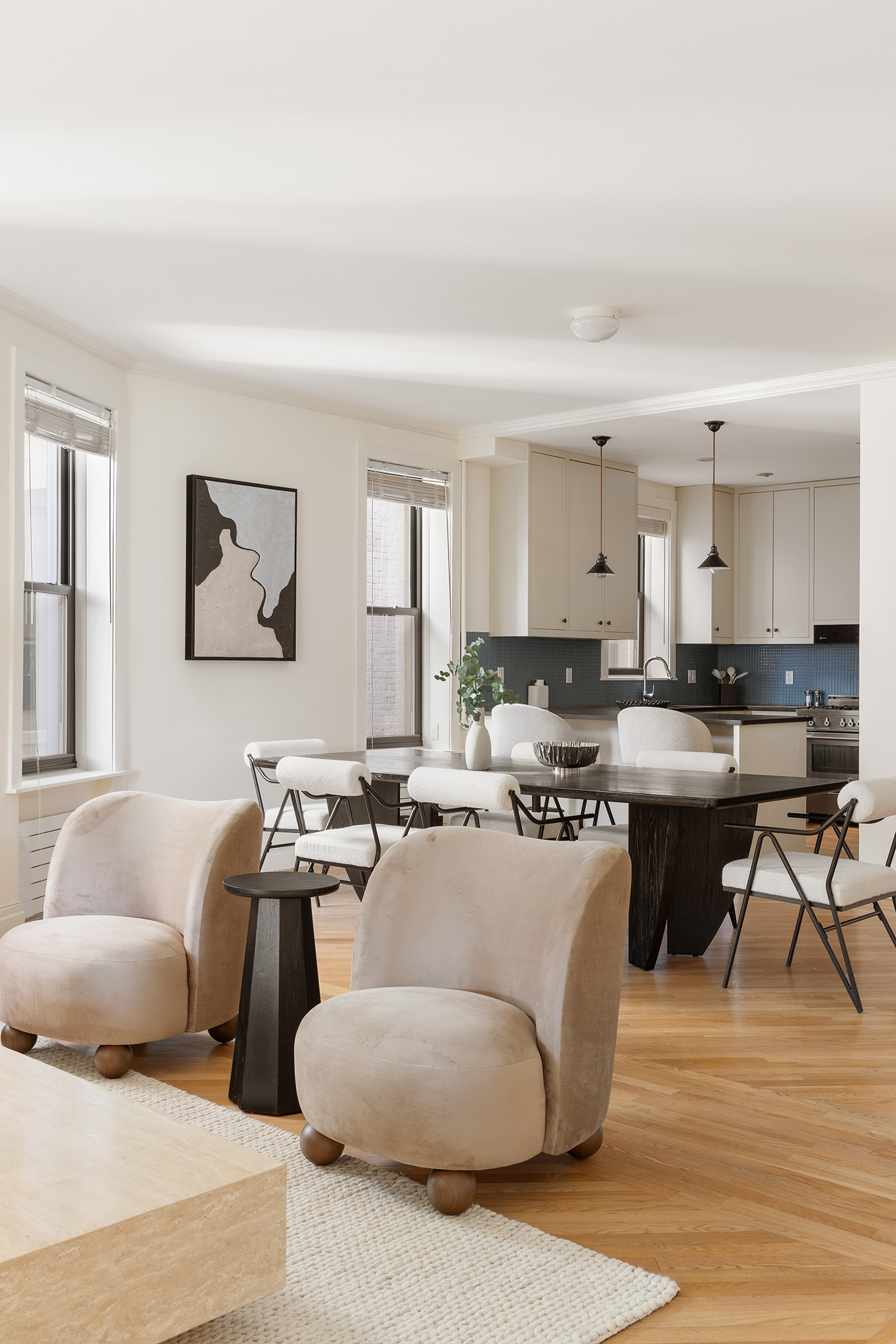 1845 Adam Clayton Powell Jr Boulevard, Unit 5C Manhattan, NY 10026 - Photo 11 of 17 a living room with furniture a kitchen view and a window