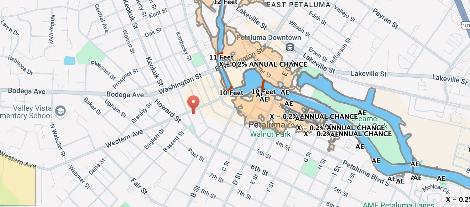 a city street lined with buildings and trees