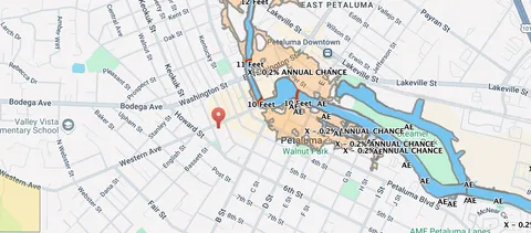 a city street lined with buildings and trees