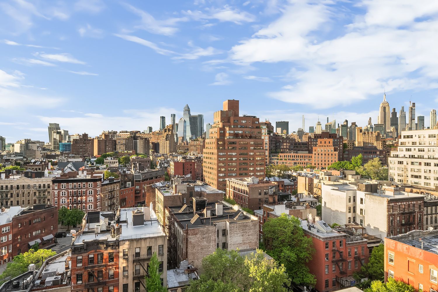 a view of a city with tall buildings