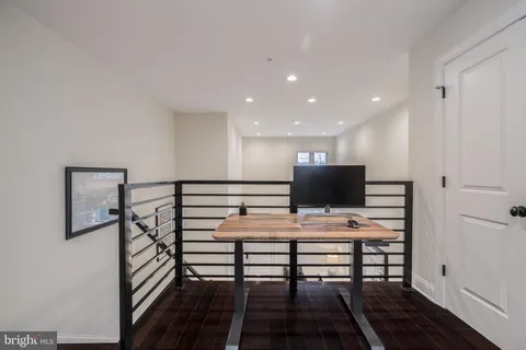 a view of a workspace with furniture