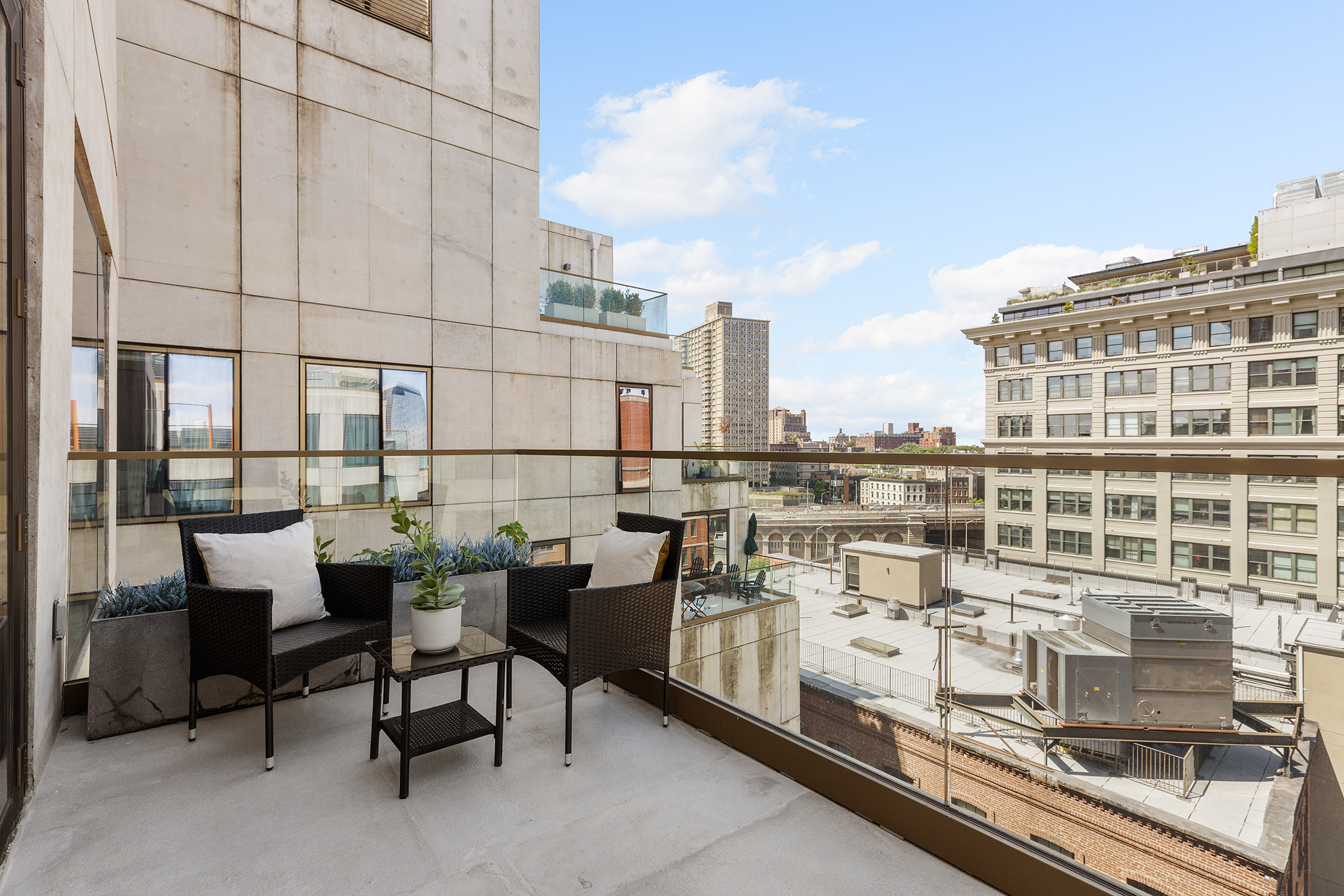 98 Front Street, Unit PH3G Brooklyn, NY 11201 - Photo 4 of 12 a view of a terrace with seating area