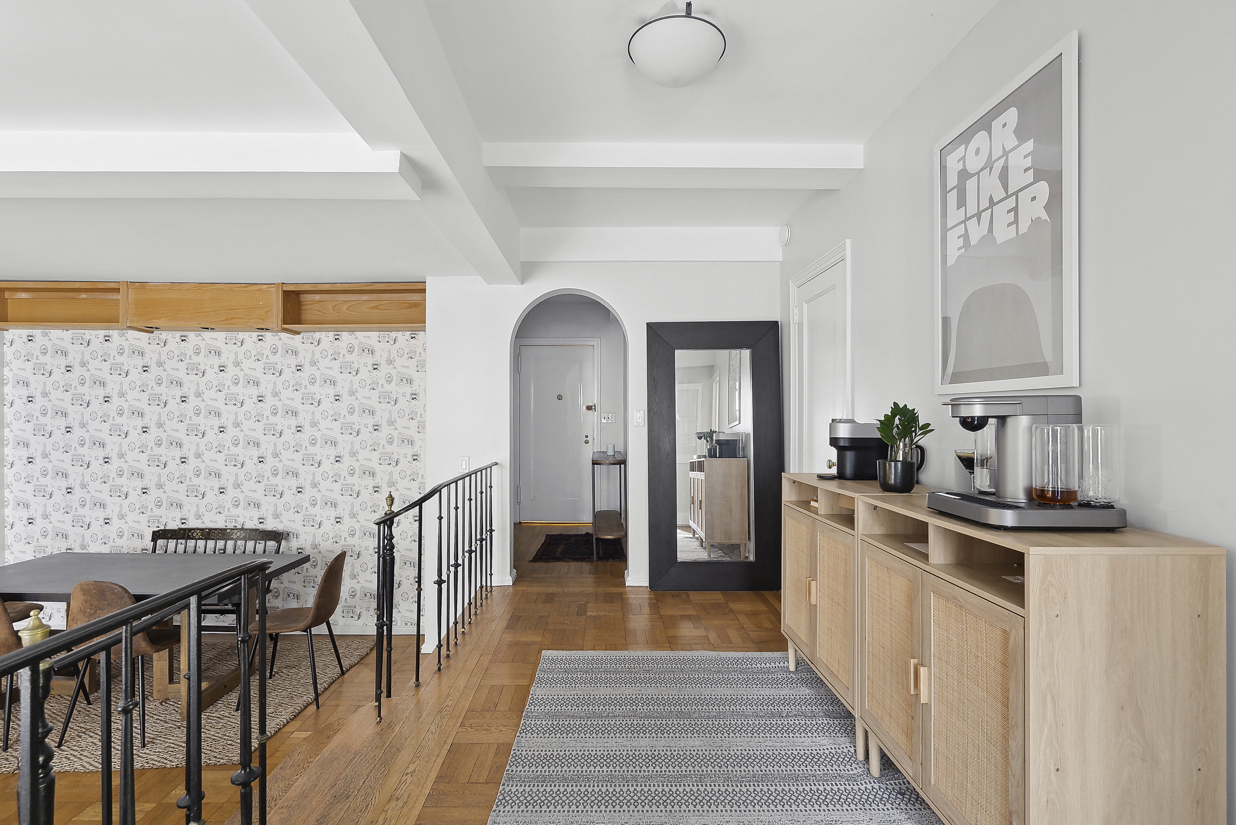 235 East 73rd Street, Unit 1D Manhattan, NY 10021 - Photo 3 of 13 a view of a kitchen from the hallway