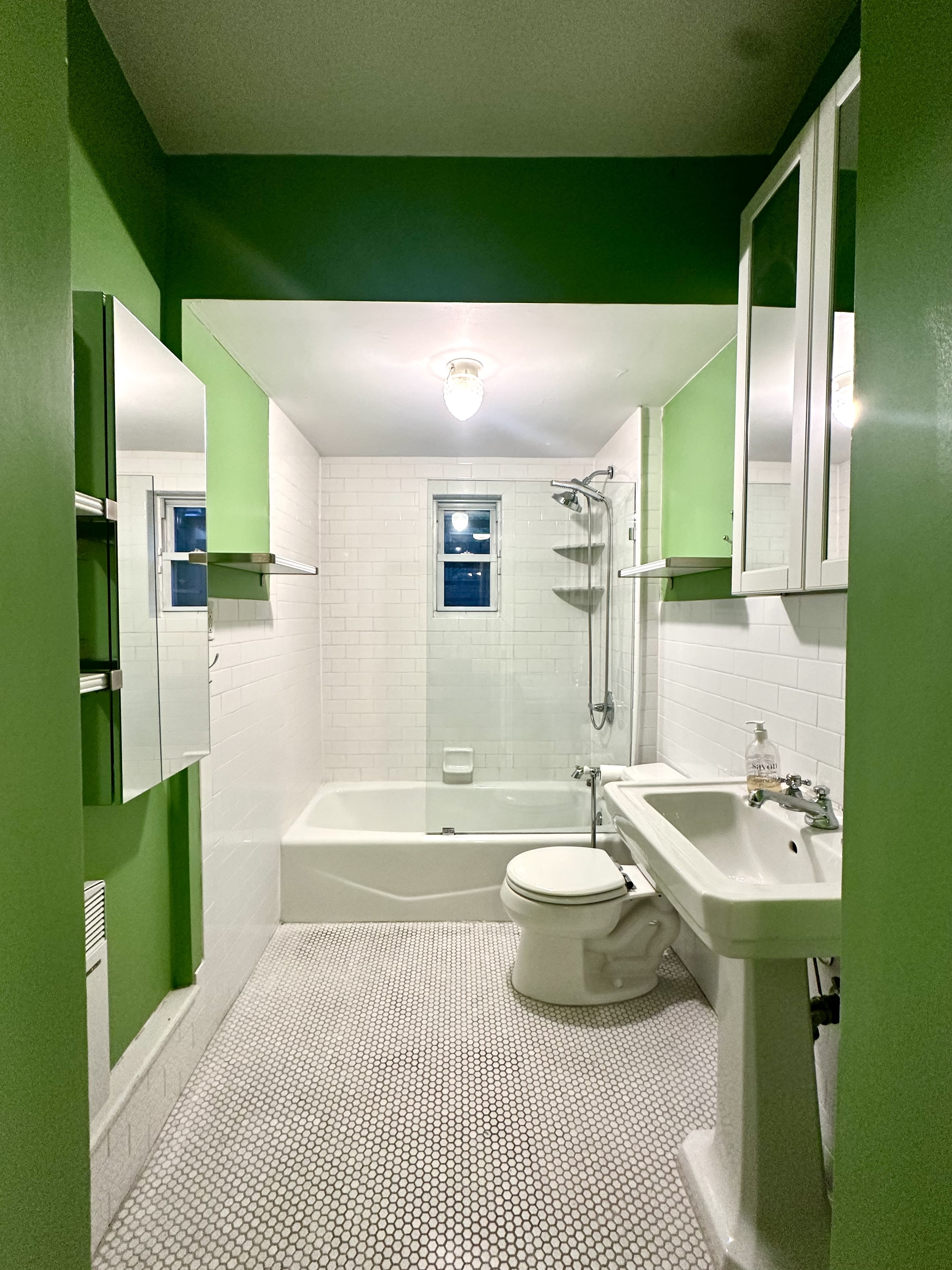 446 Sackett Street Brooklyn, NY 11231 - Photo 12 of 15 a bathroom with a sink and a mirror