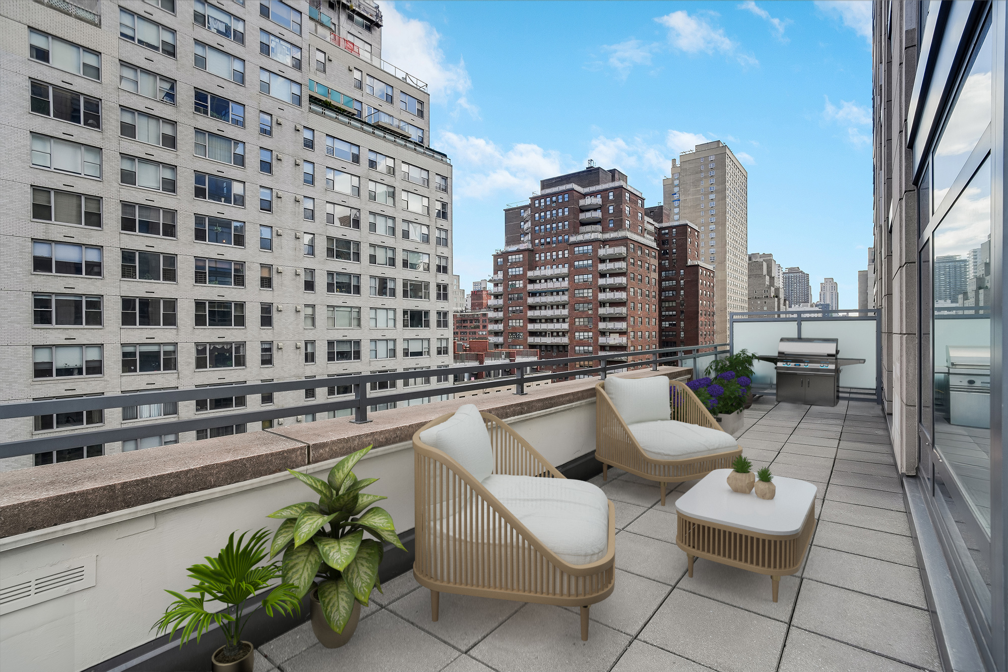 450 East 83rd Street, Unit 6B Manhattan, NY 10028 - Photo 4 of 25 a balcony with chairs and city view