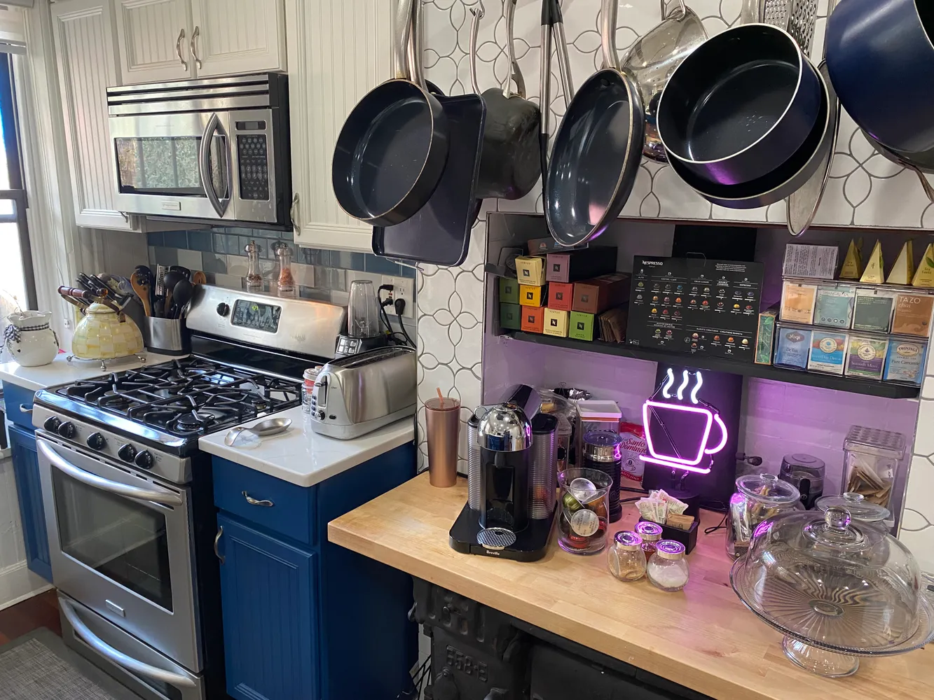 a kitchen with lots of appliances and cabinets