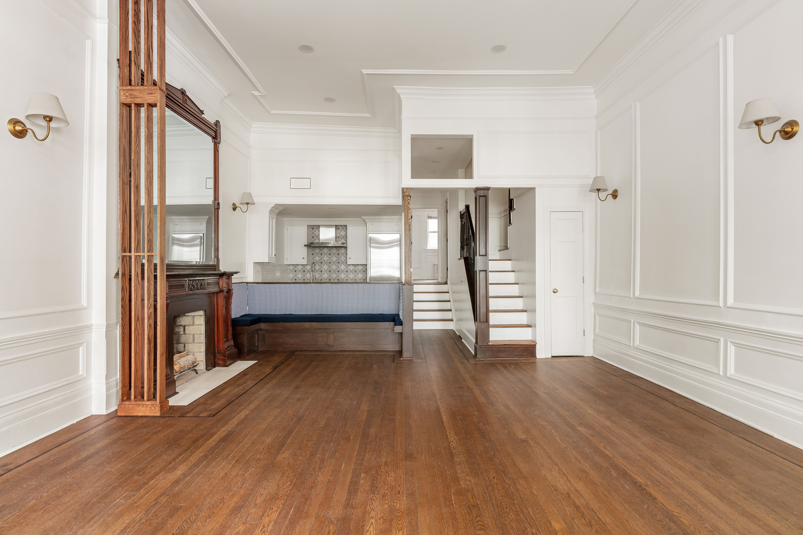 129 East 61st Street, Unit 3 Manhattan, NY 10065 - Photo 3 of 13 wooden floor in an empty room with a window