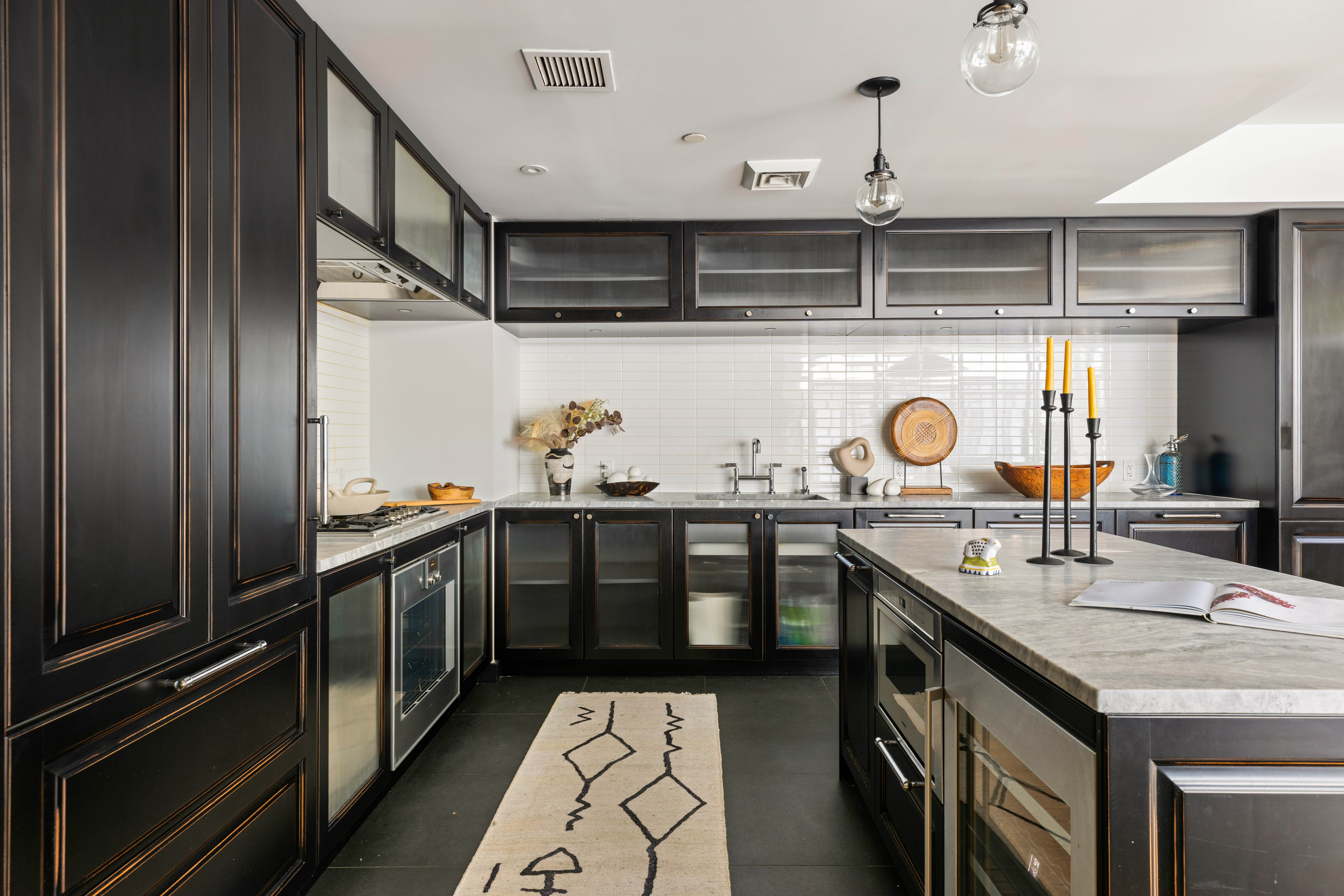 51 Jay Street, Unit 5O Brooklyn, NY 11201 - Photo 4 of 13 a kitchen with stainless steel appliances granite countertop a sink and cabinets