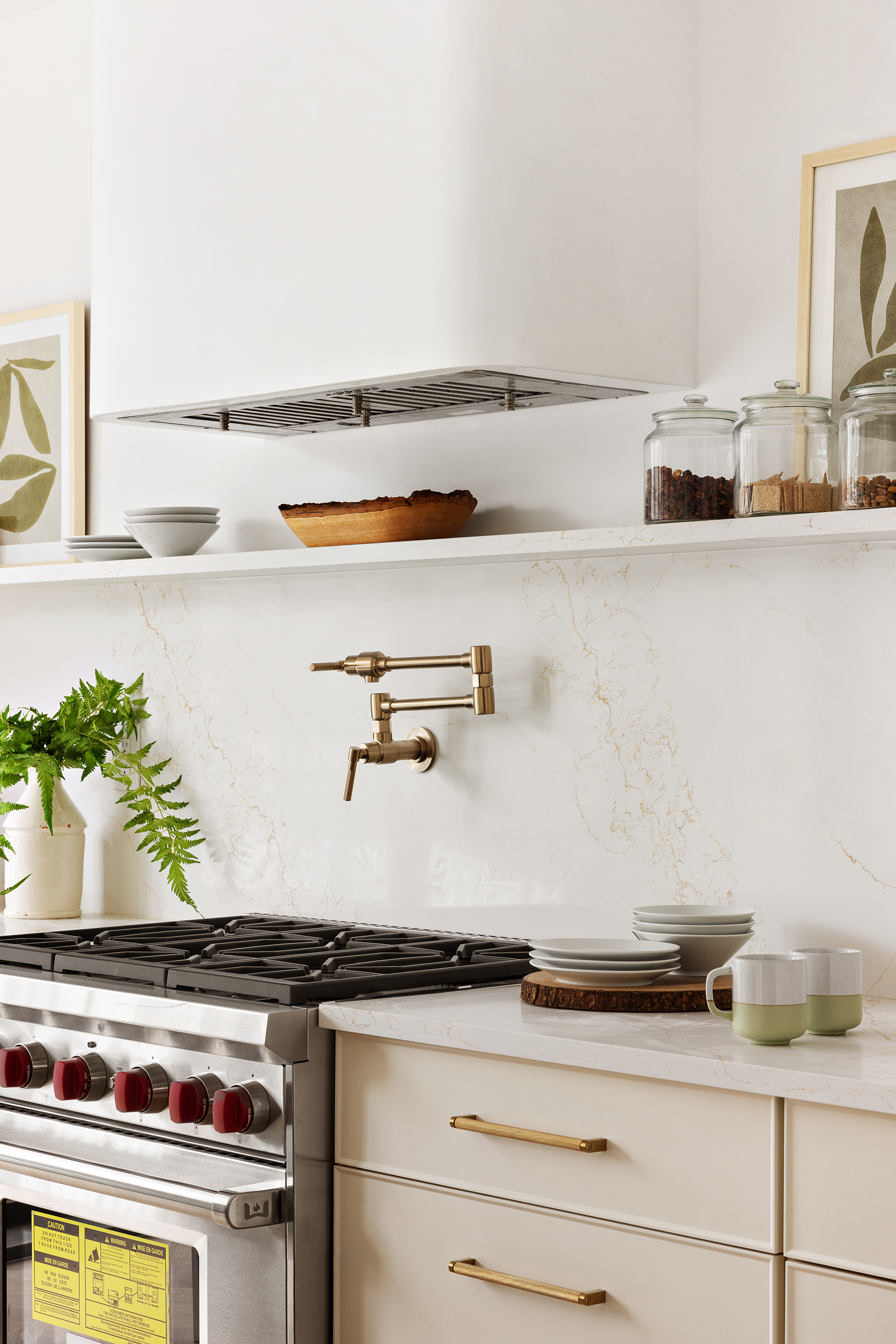 557 Saint Marks Avenue Brooklyn, NY 11216 - Photo 7 of 13 a kitchen with stainless steel appliances granite countertop a sink and a stove