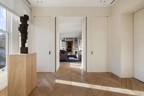 a view of a bedroom from a hallway
