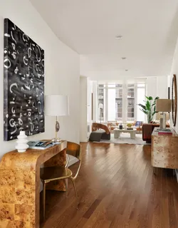 a living room with furniture and a couch