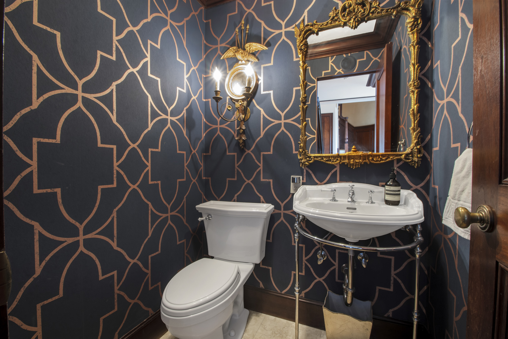 21 South End Avenue, Unit PH1A Manhattan, NY 10280 - Photo 18 of 32 a bathroom with a sink toilet and a mirror