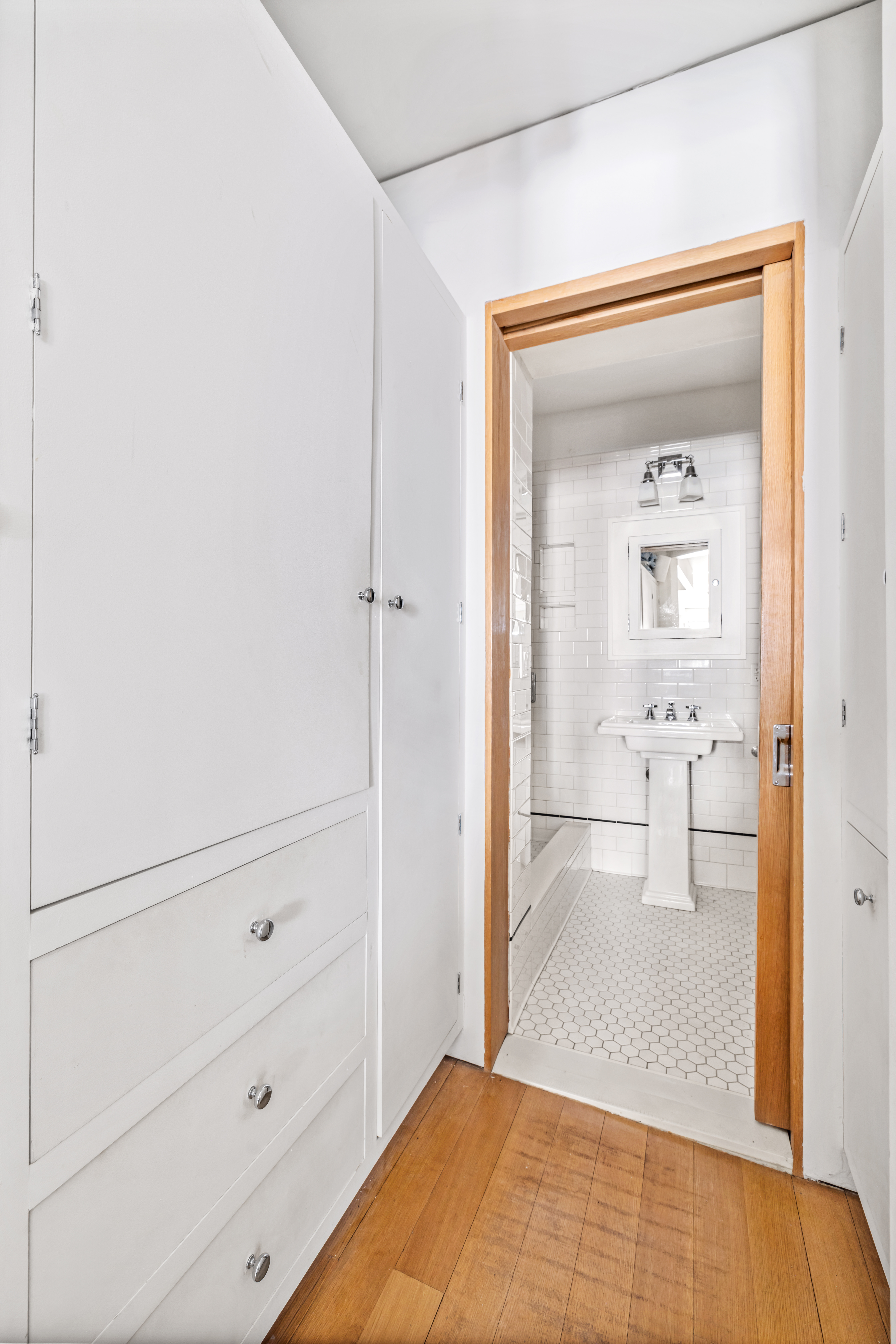 26 Cornelia Street, Unit 12 Manhattan, NY 10014 - Photo 5 of 7 a view of a bedroom from a hallway