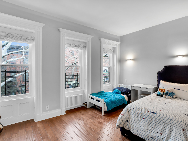 1124 Prospect Place, Unit PLEX Brooklyn, NY 11213 - Photo 13 of 15 a bedroom with two beds and a window