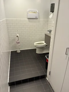 a view of a workspace with furniture