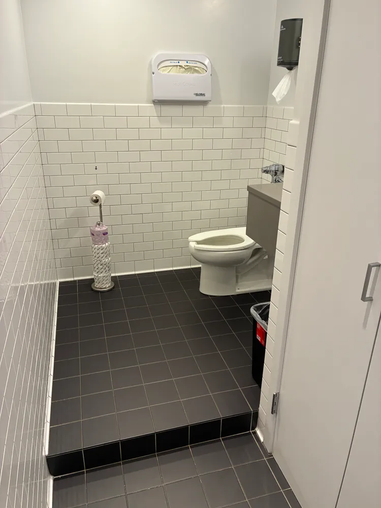 a view of a workspace with furniture