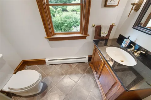 a view of a swimming pool with a yard