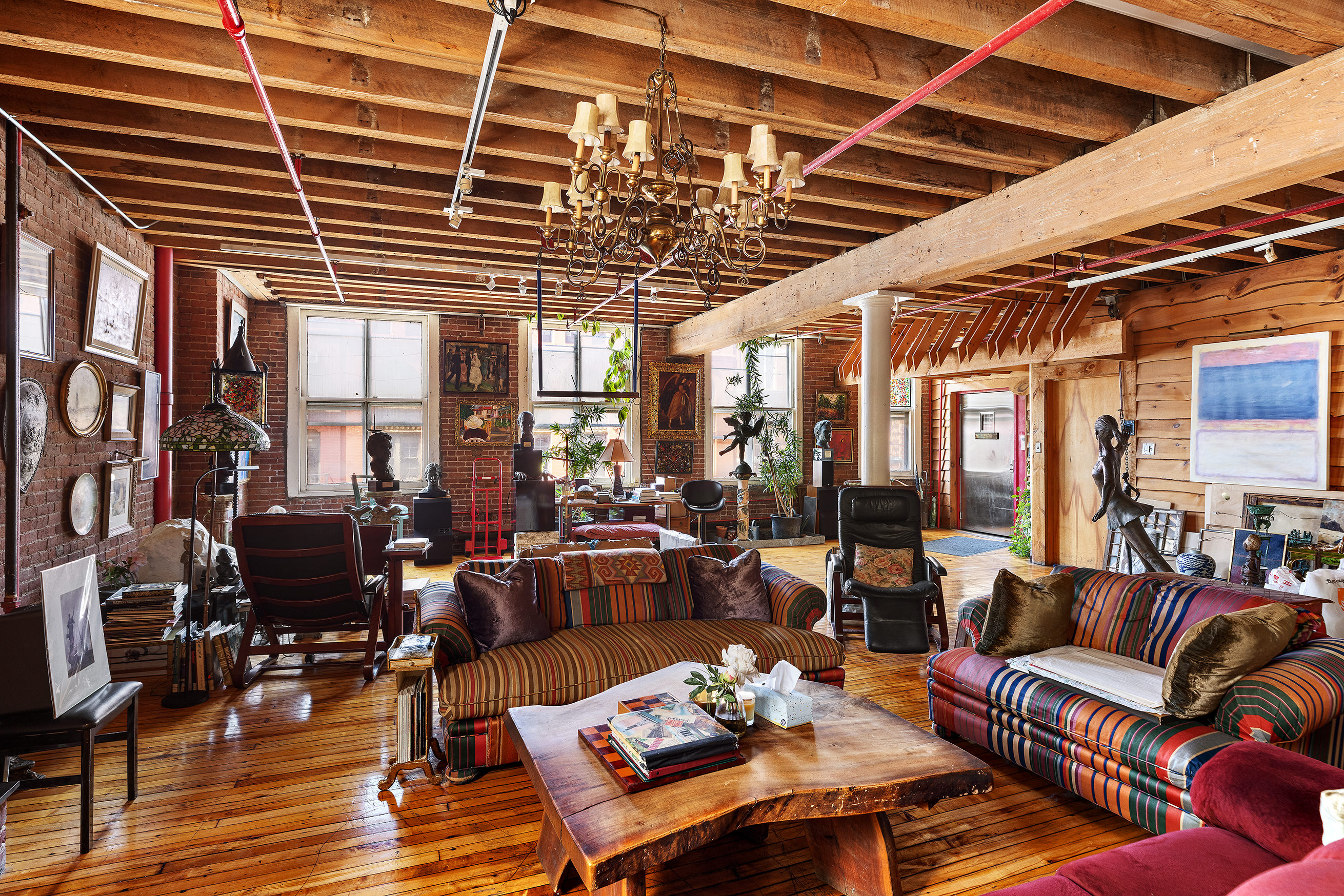 465 West Broadway, Unit 4S Manhattan, NY 10012 - Photo 3 of 7 a living room with furniture