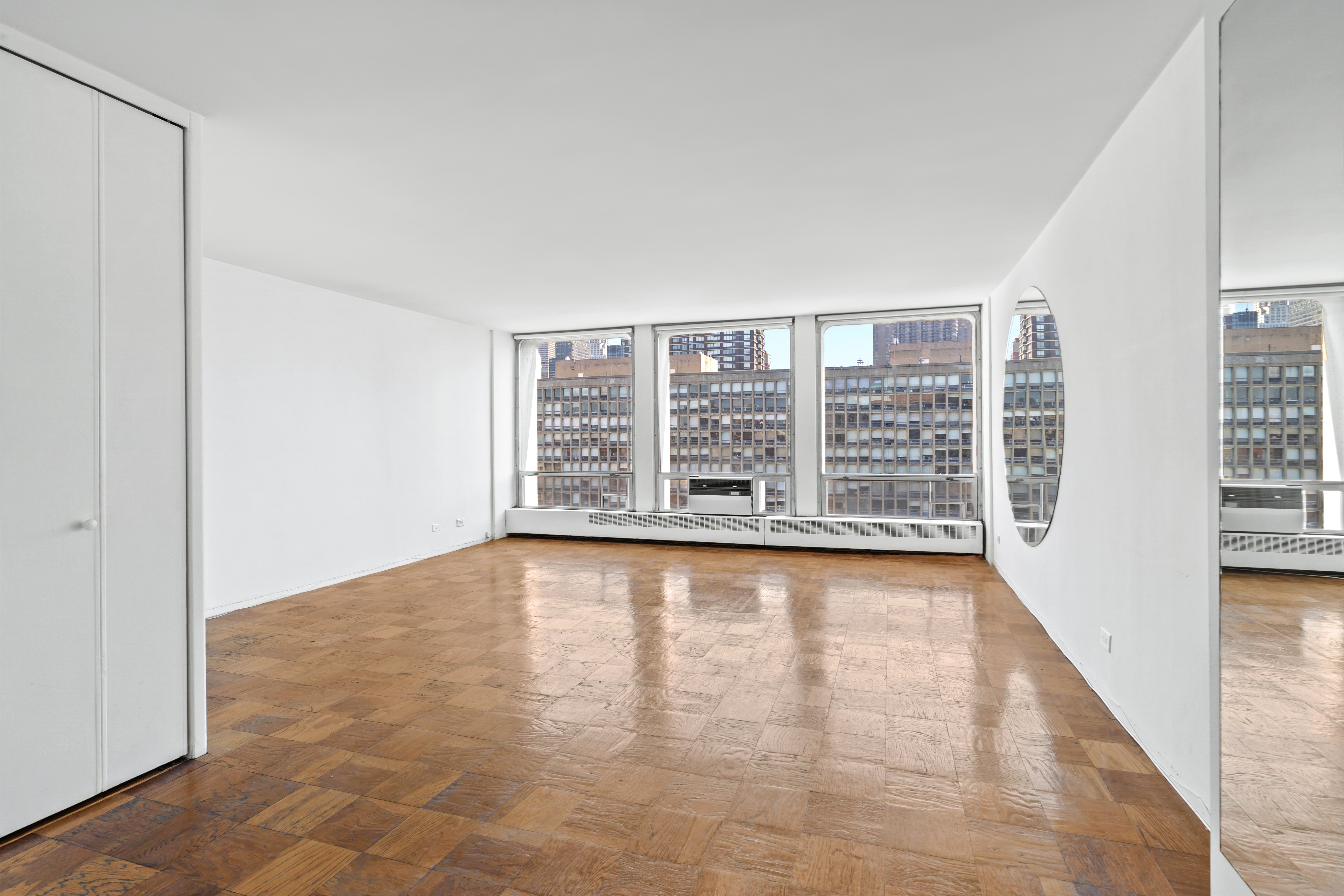333 East 30th Street, Unit 18N Manhattan, NY 10016 - Photo 2 of 18 a view of an empty room with a window