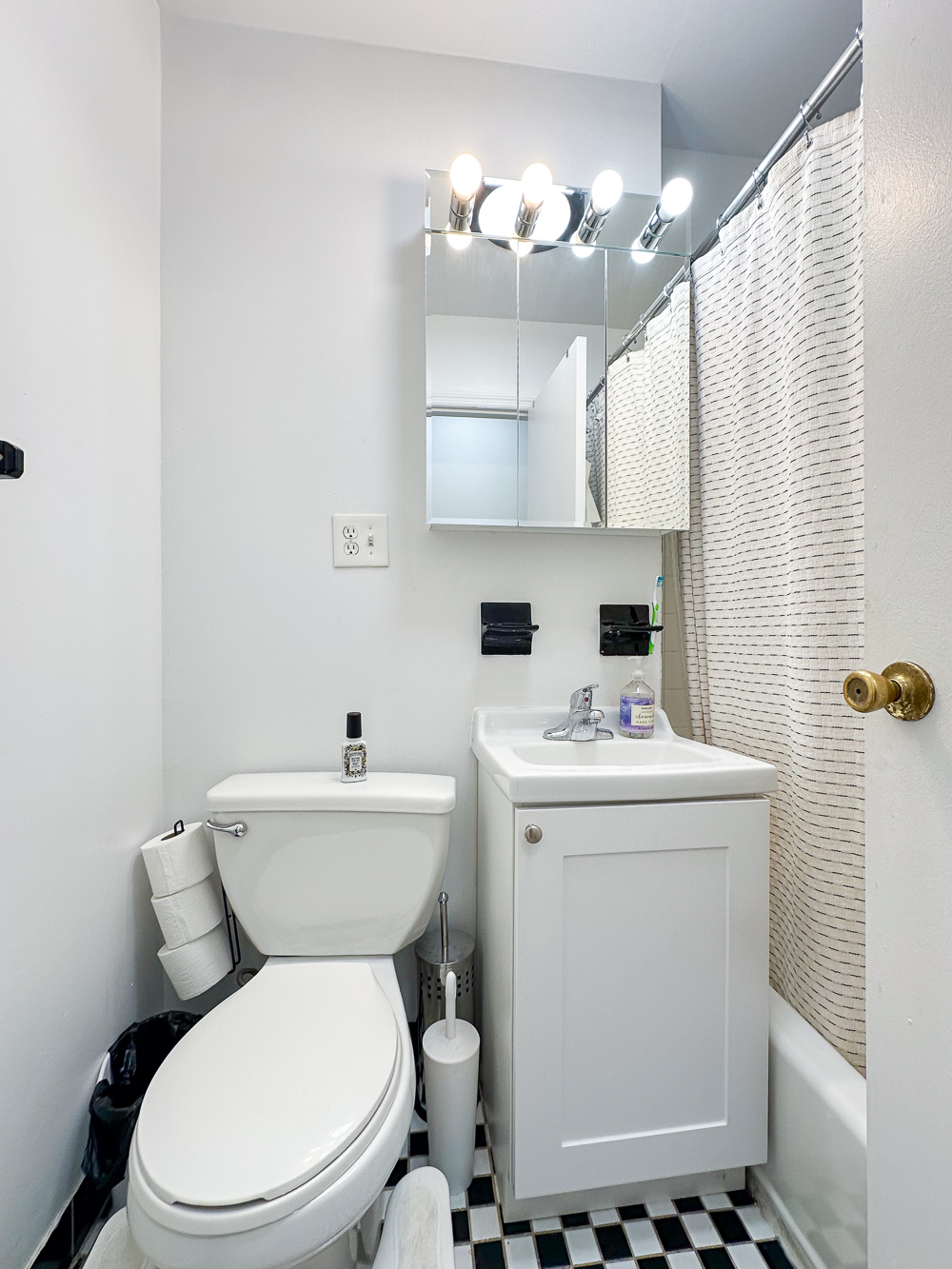 321 East 25th Street, Unit 3A Manhattan, NY 10010 - Photo 8 of 15 a bathroom with a sink a toilet and mirror