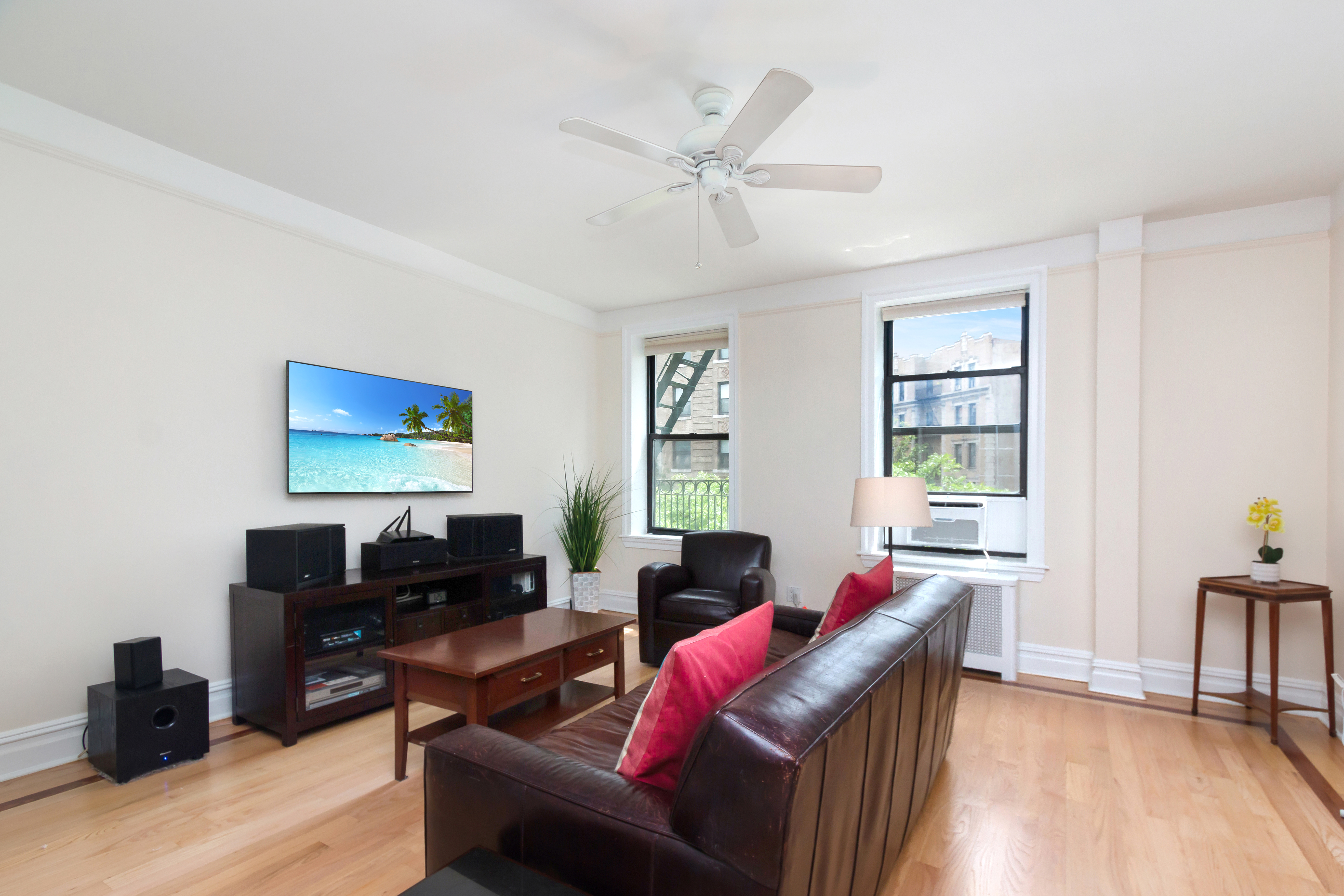 801 Riverside Drive, Unit 4F Manhattan, NY 10032 - Photo 3 of 13 a living room with furniture and wooden floor
