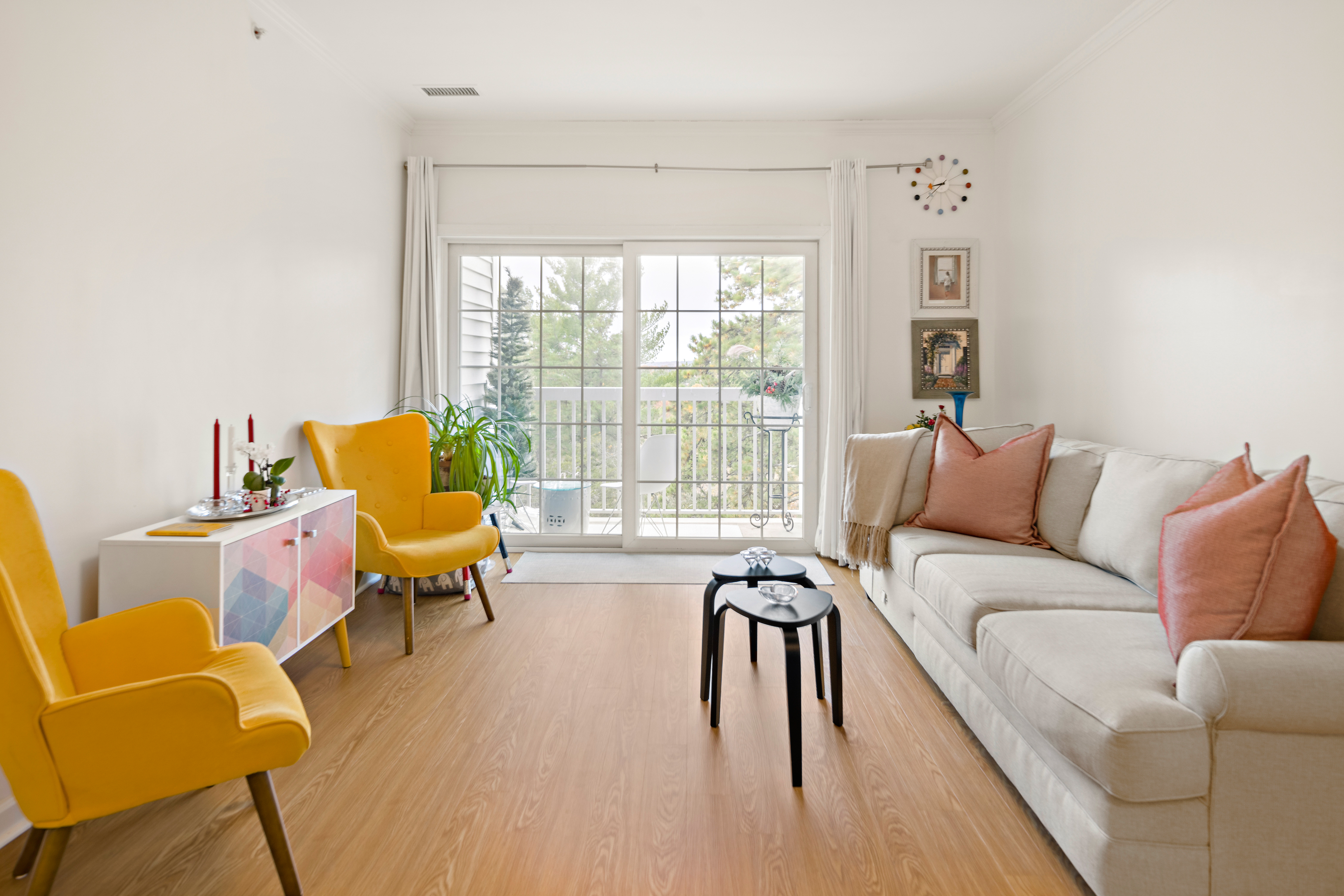 107 Clocktower Drive, Unit 407 Waltham, MA 02452 - Photo 6 of 19 a living room with furniture and a large window
