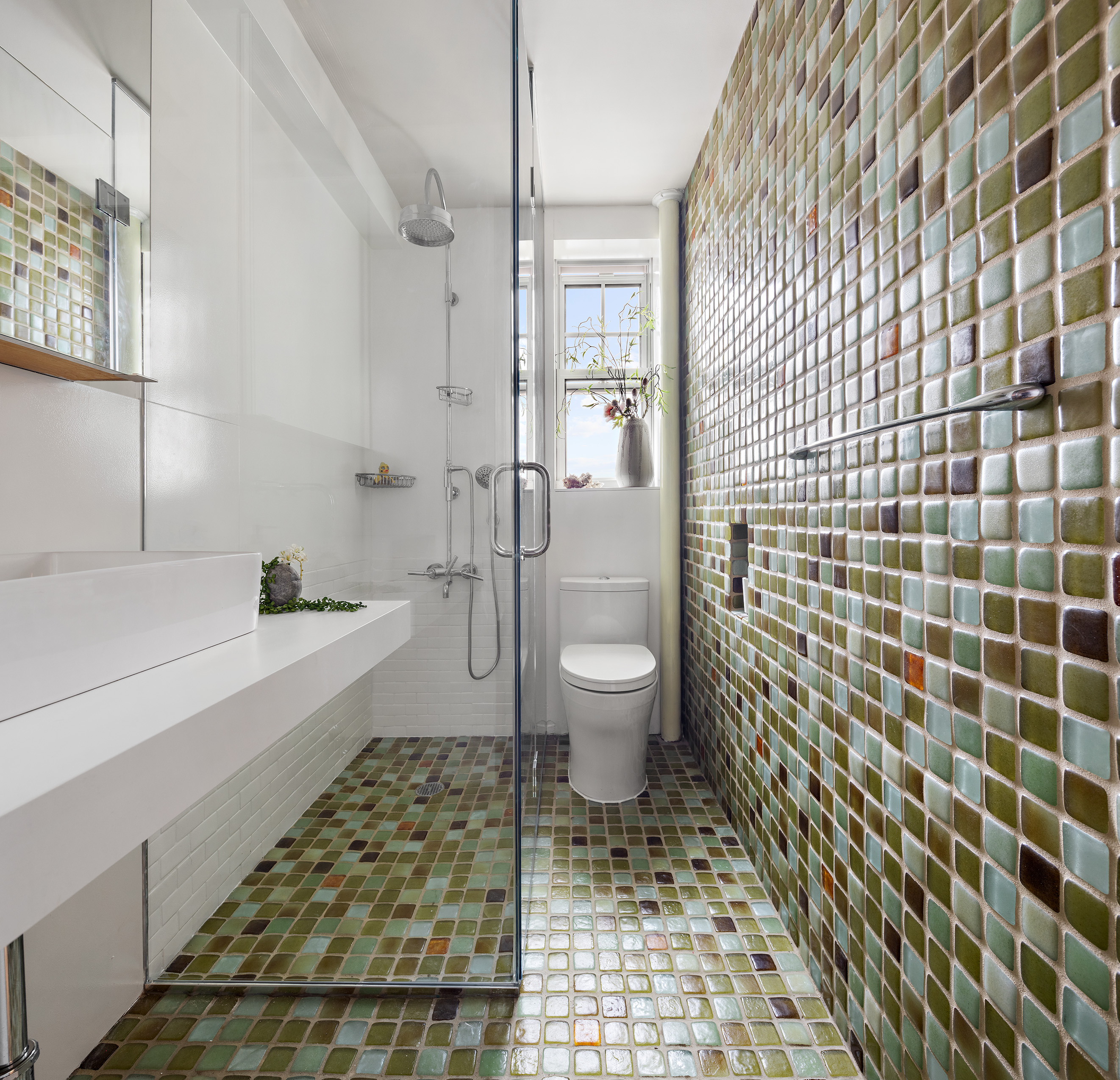 302 West 12th Street, Unit 11F Manhattan, NY 10014 - Photo 13 of 17 a bathroom with a sink toilet and shower