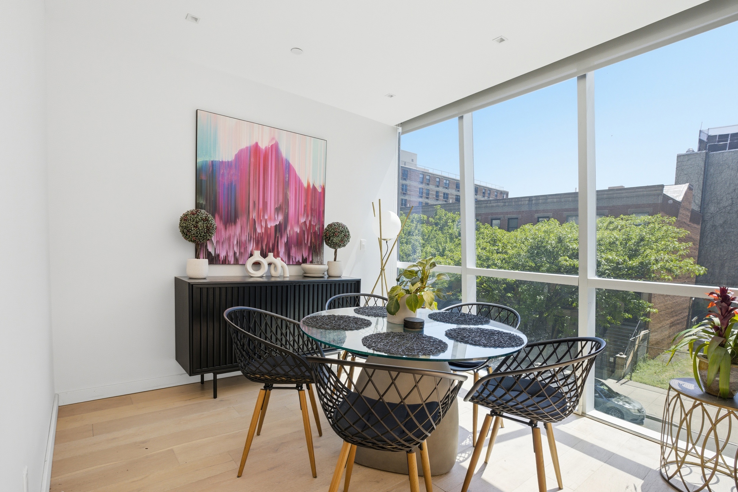 313 West 121st Street, Unit 2 Manhattan, NY 10027 - Photo 4 of 12 a view of a dining room with furniture window and outside view