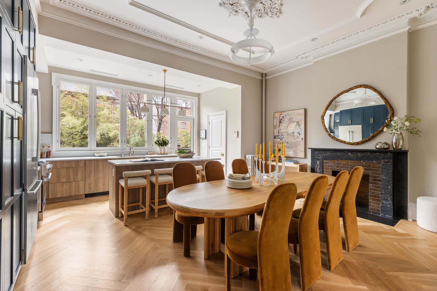 a view of a dining room with furniture window and outside view