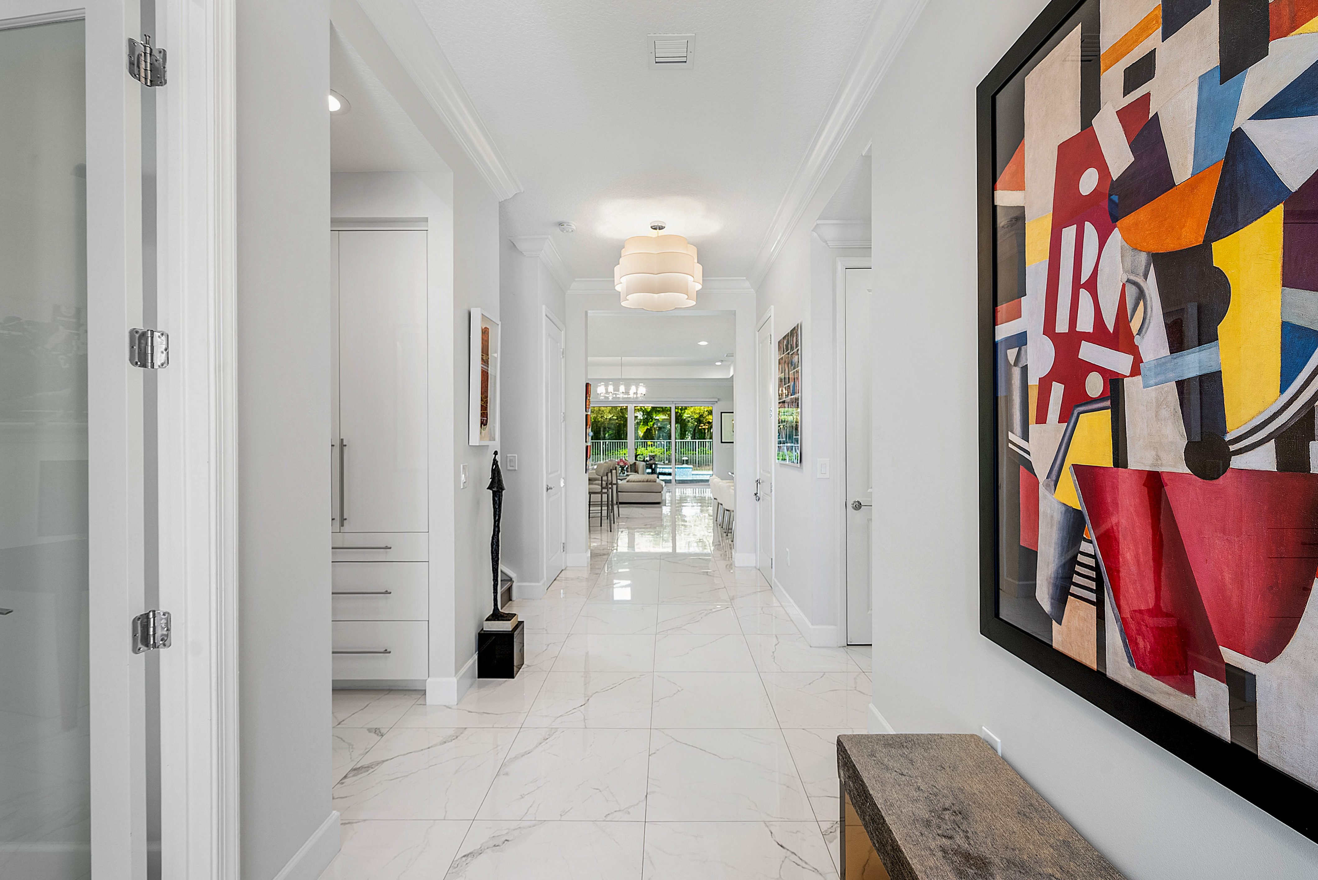 13172 Whistler Mountain Road Delray Beach, FL 33446 - Photo 7 of 38 a view of an entryway with wooden floor