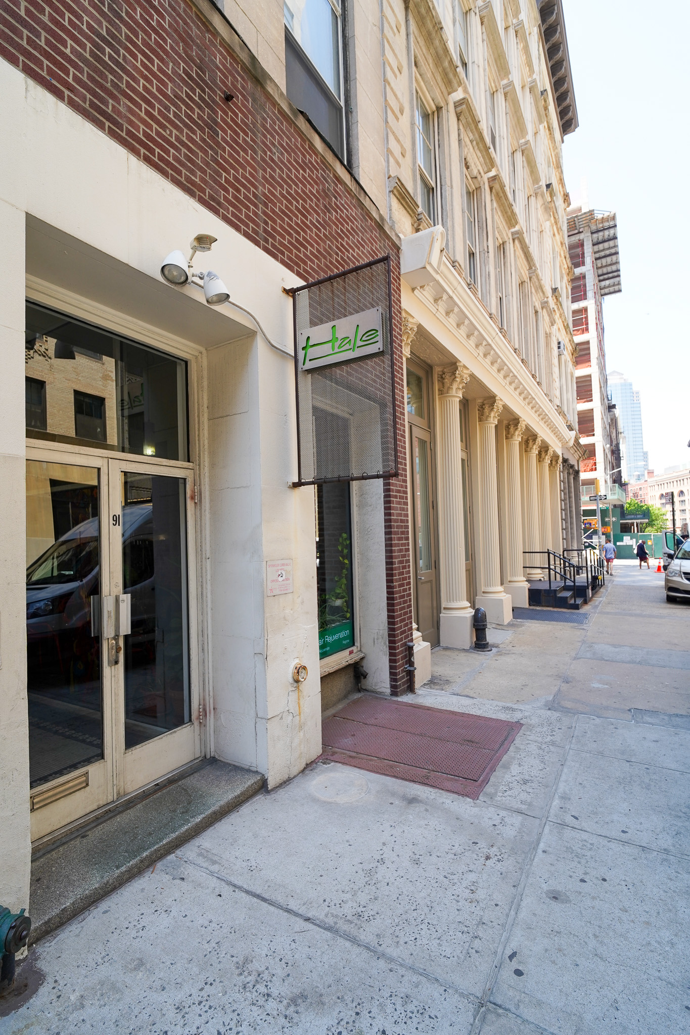 91 Franklin Street, Unit RETAIL Manhattan, NY 10013 - Photo 18 of 19 a view of a building with a street