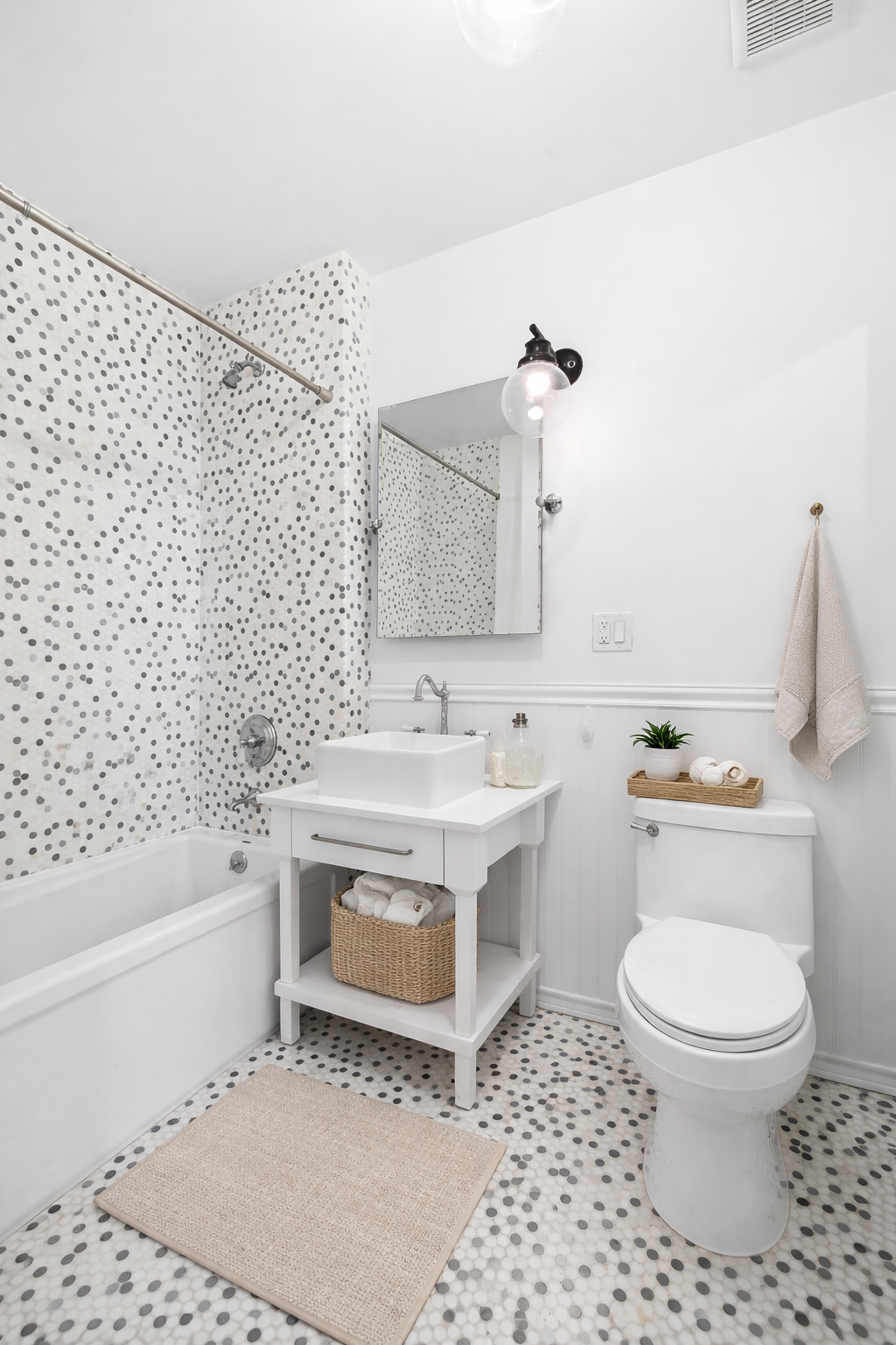 180 Bainbridge Street, Unit 304 Brooklyn, NY 11233 - Photo 5 of 21 a bathroom with a sink a toilet and a bathtub