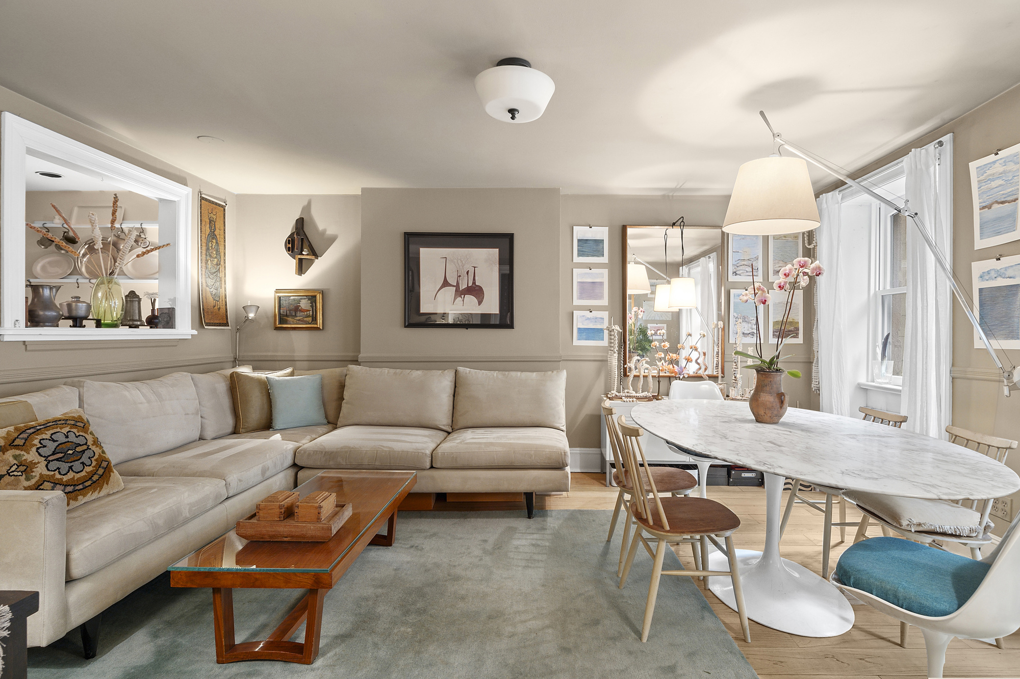 139 St Felix Street, Unit GARDEN Brooklyn, NY 11217 - Photo 1 of 6 a living room with furniture and a chandelier