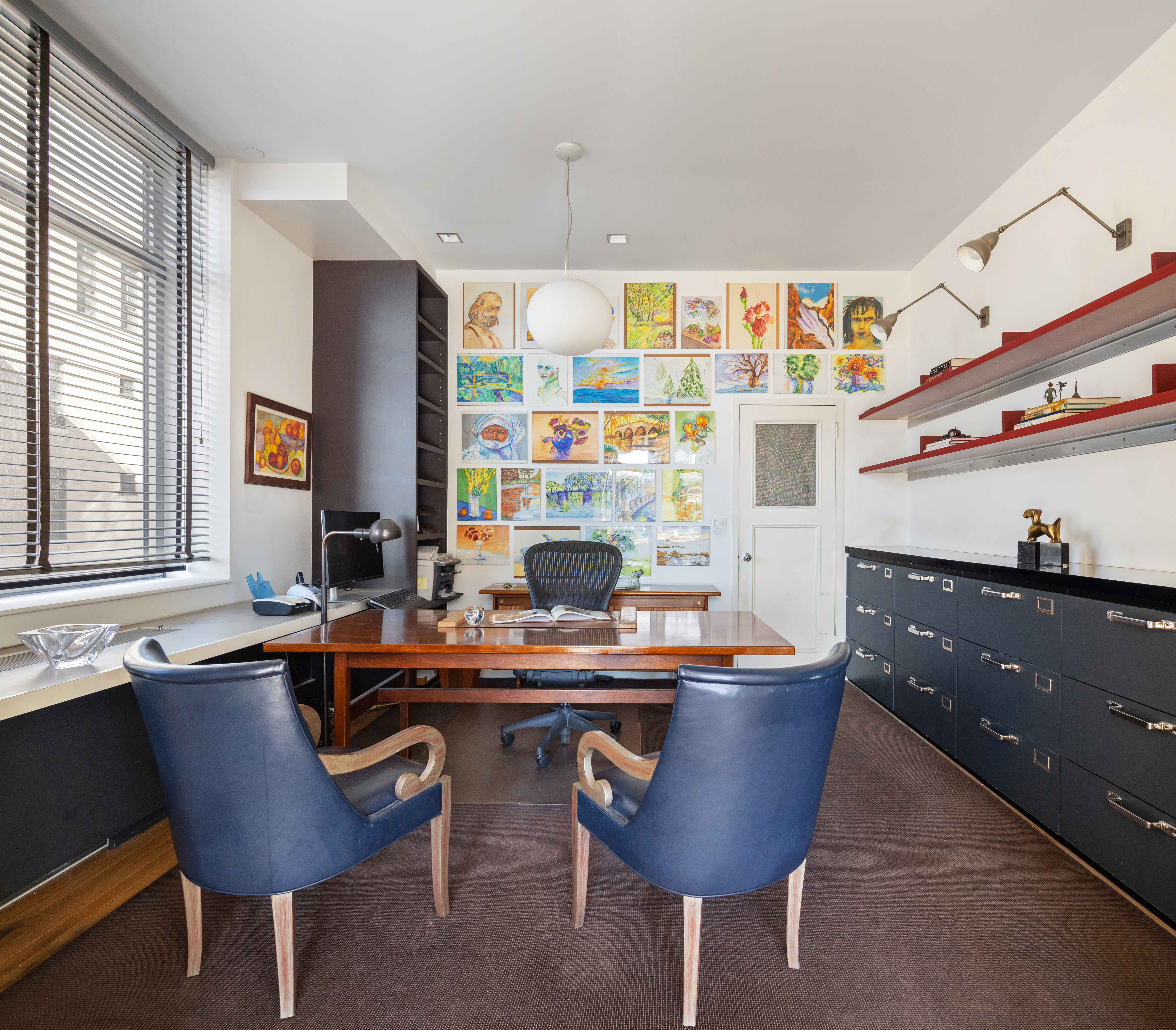 252 7th Avenue, Unit 9X Manhattan, NY 10001 - Photo 14 of 26 a room with a table chairs and a refrigerator