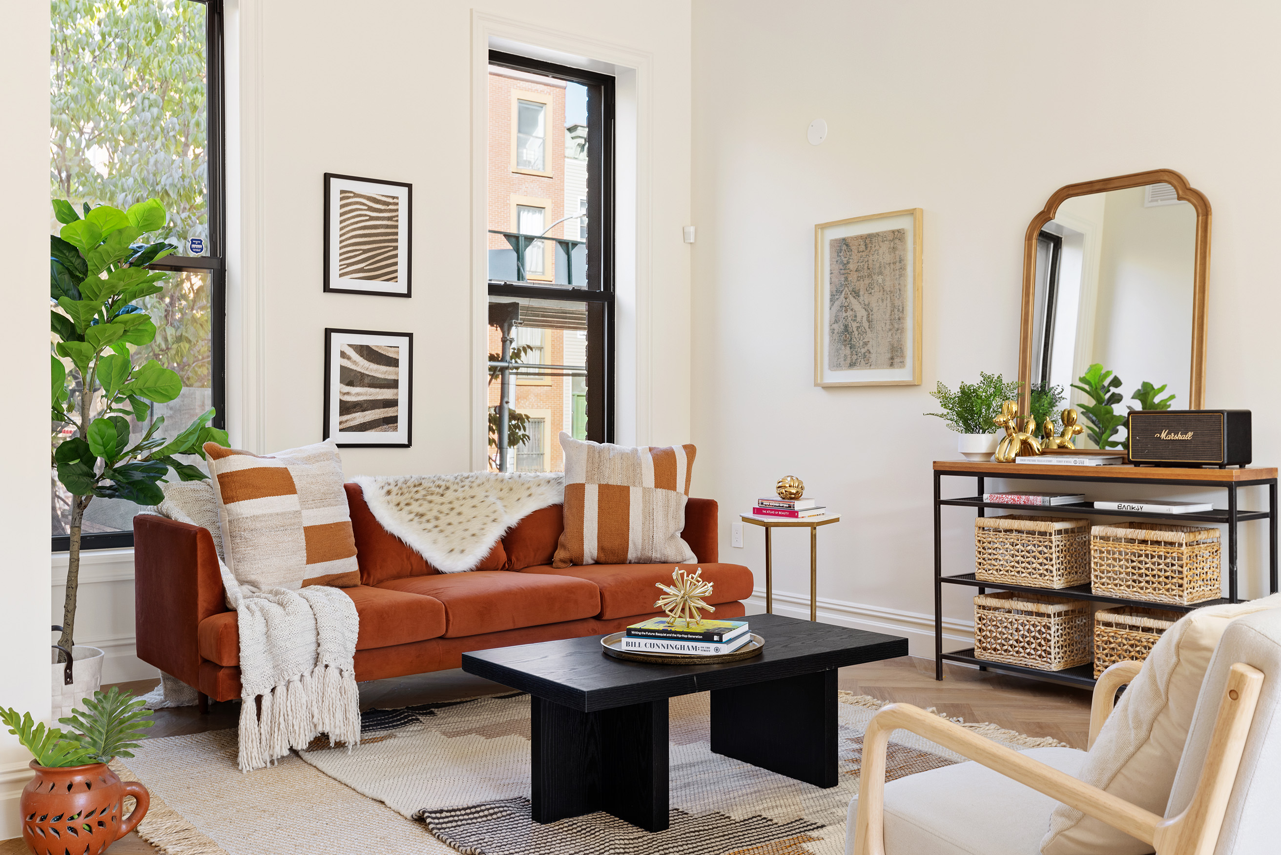198 Madison Street, Unit SF Brooklyn, NY 11216 - Photo 3 of 19 a living room with furniture and flowers