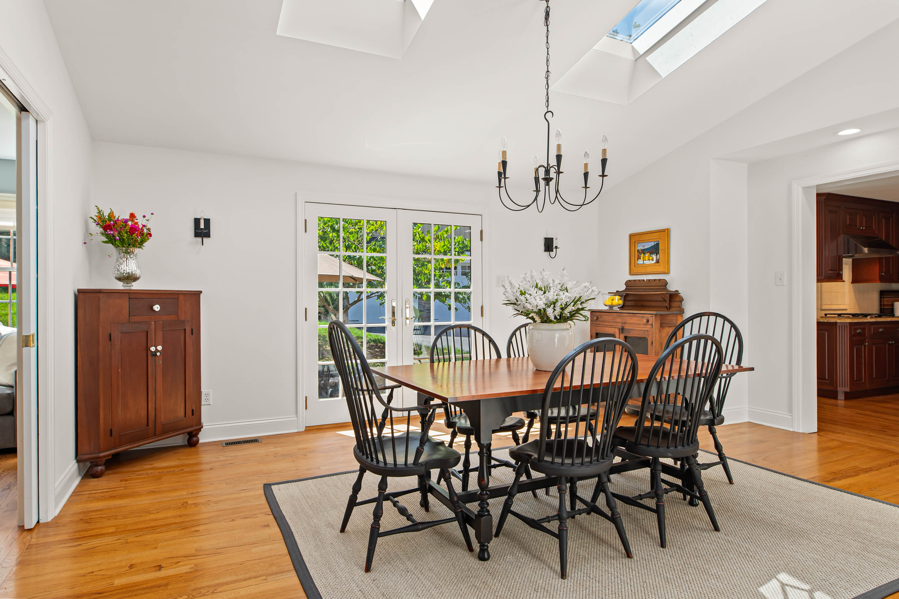 1136 Seaton Ross Road Wayne, PA 19087 - Photo 9 of 48 a view of a dining room with furniture window and wooden floor