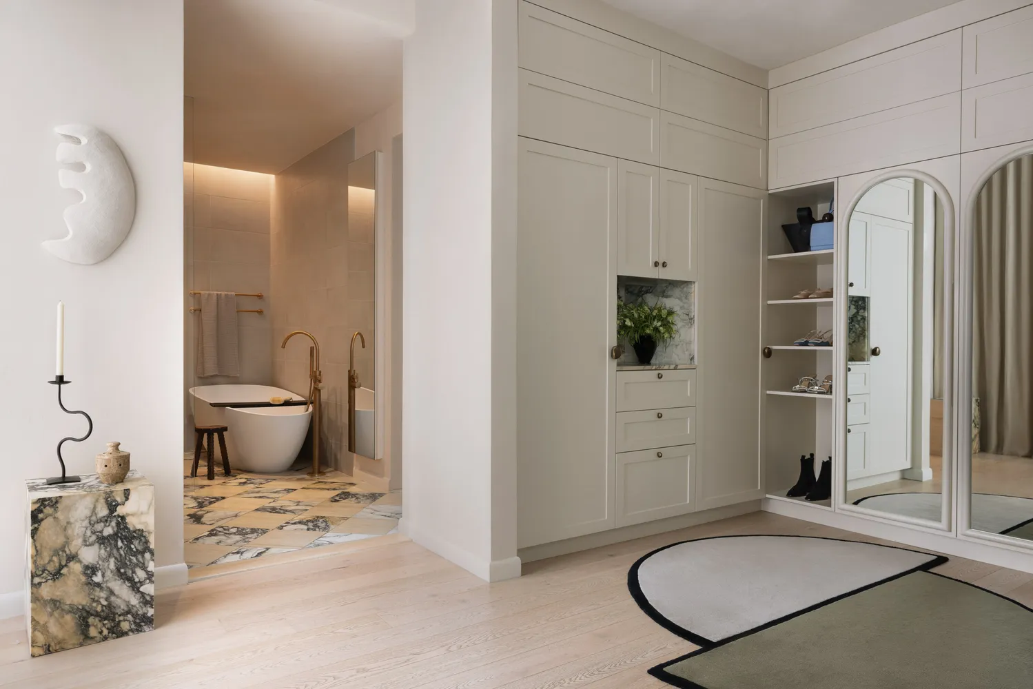 a bathroom with a granite countertop sink a toilet and shower