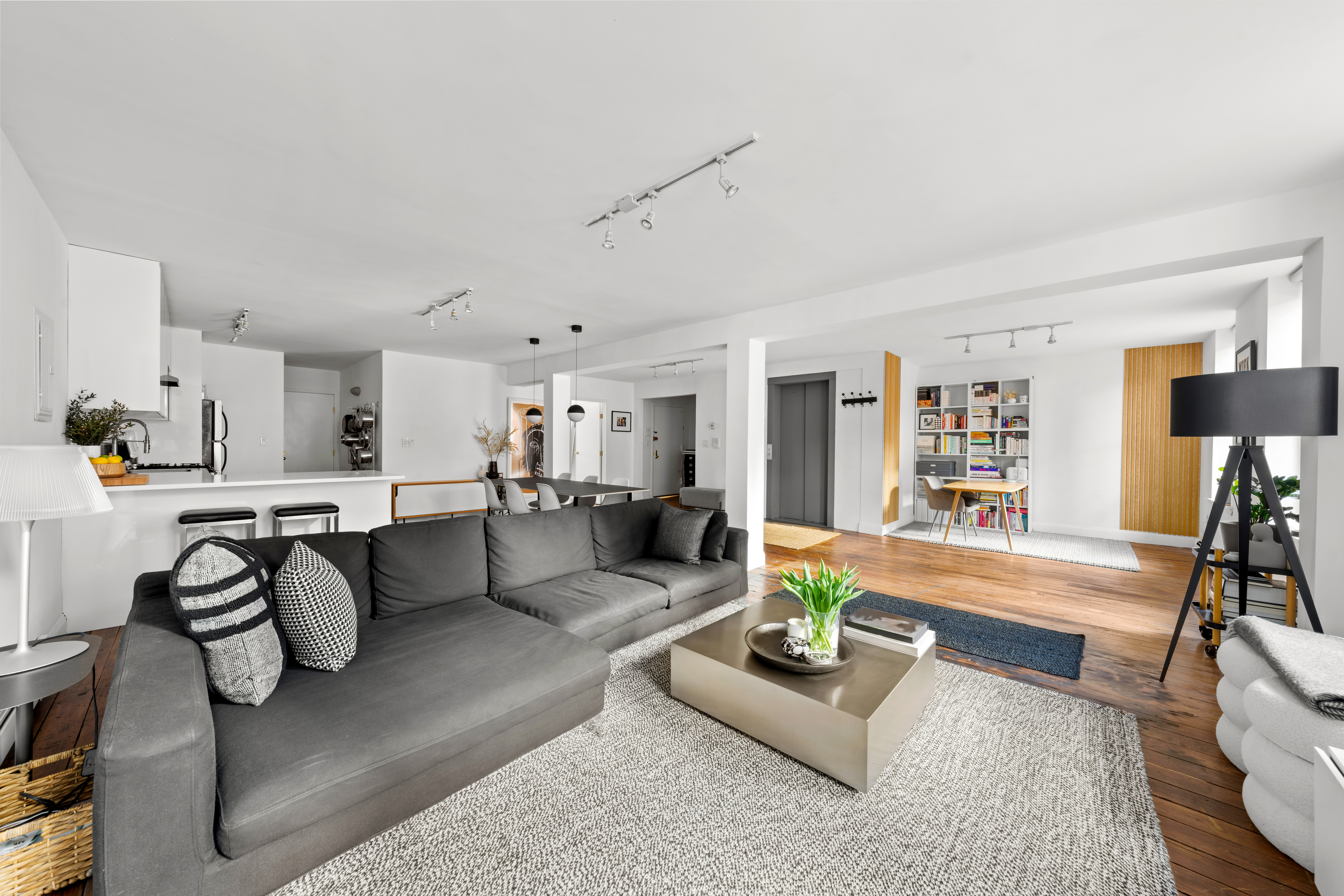 a living room with furniture and a couch