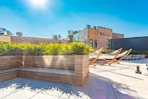 a view of a terrace with chairs