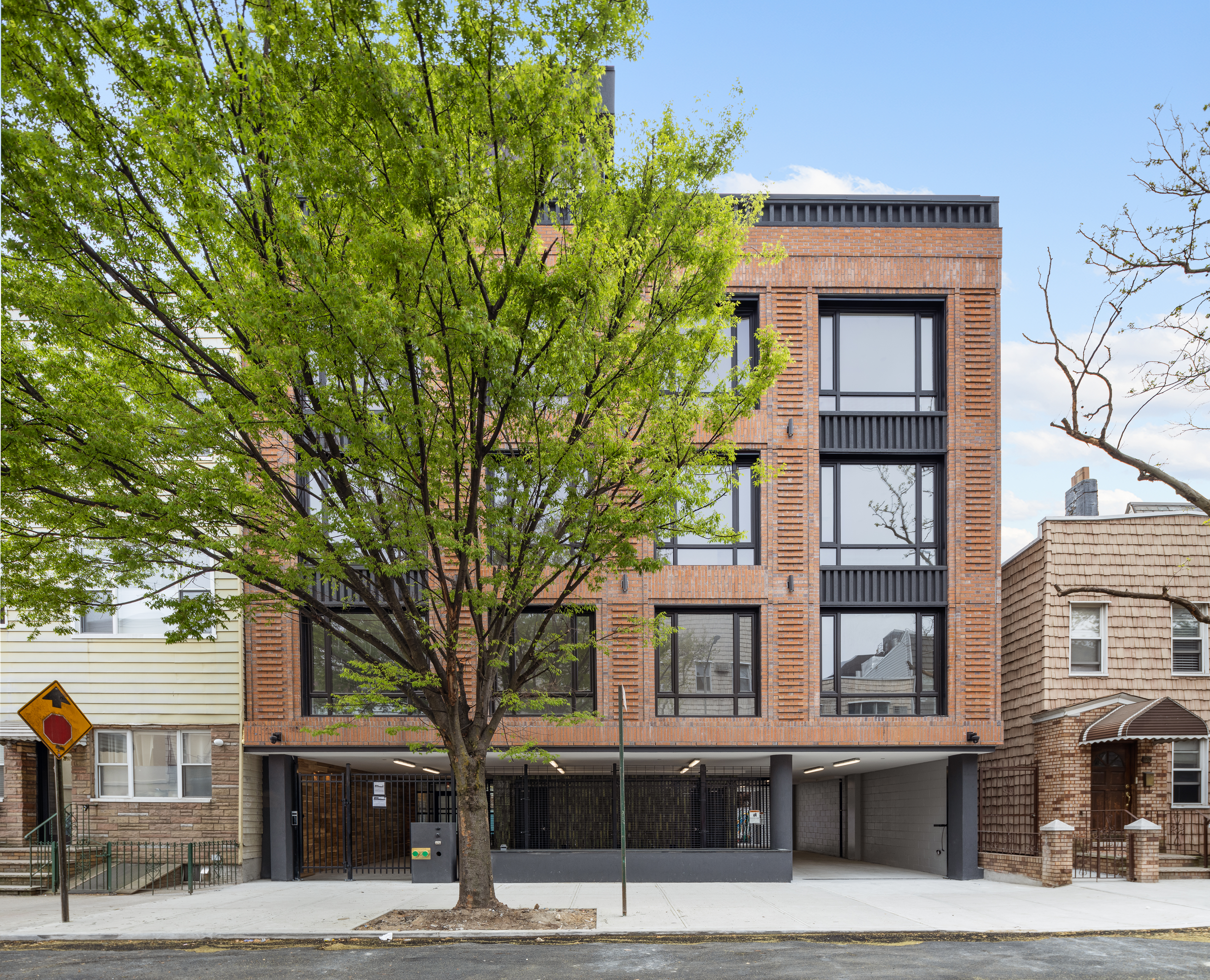 124 Withers Street, Unit 4C Brooklyn, NY 11211 - Photo 7 of 10 a front view of residential houses with street