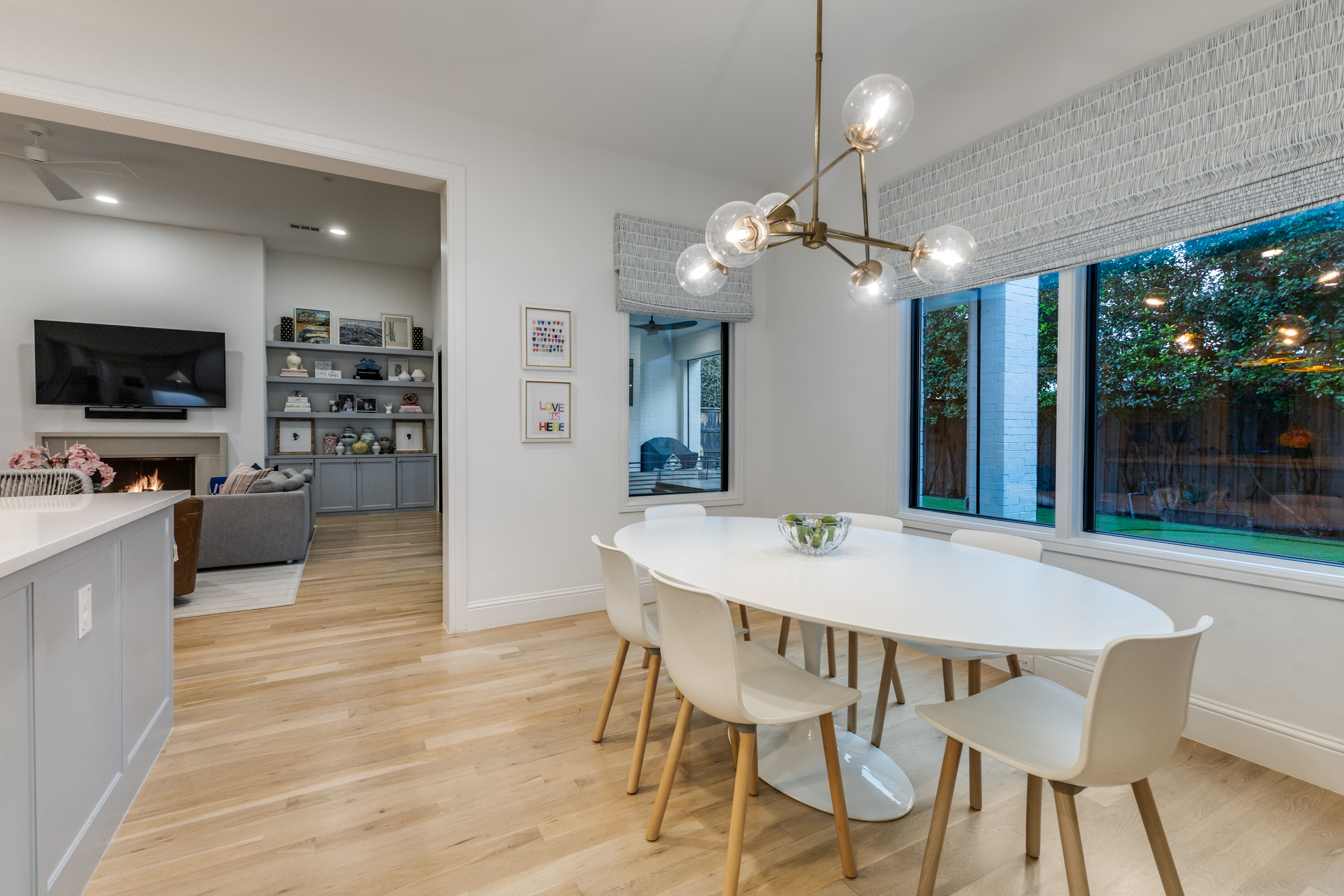 4042 Dunhaven Road Dallas, TX 75220 - Photo 12 of 34 a view of a dining room with furniture window and wooden floor