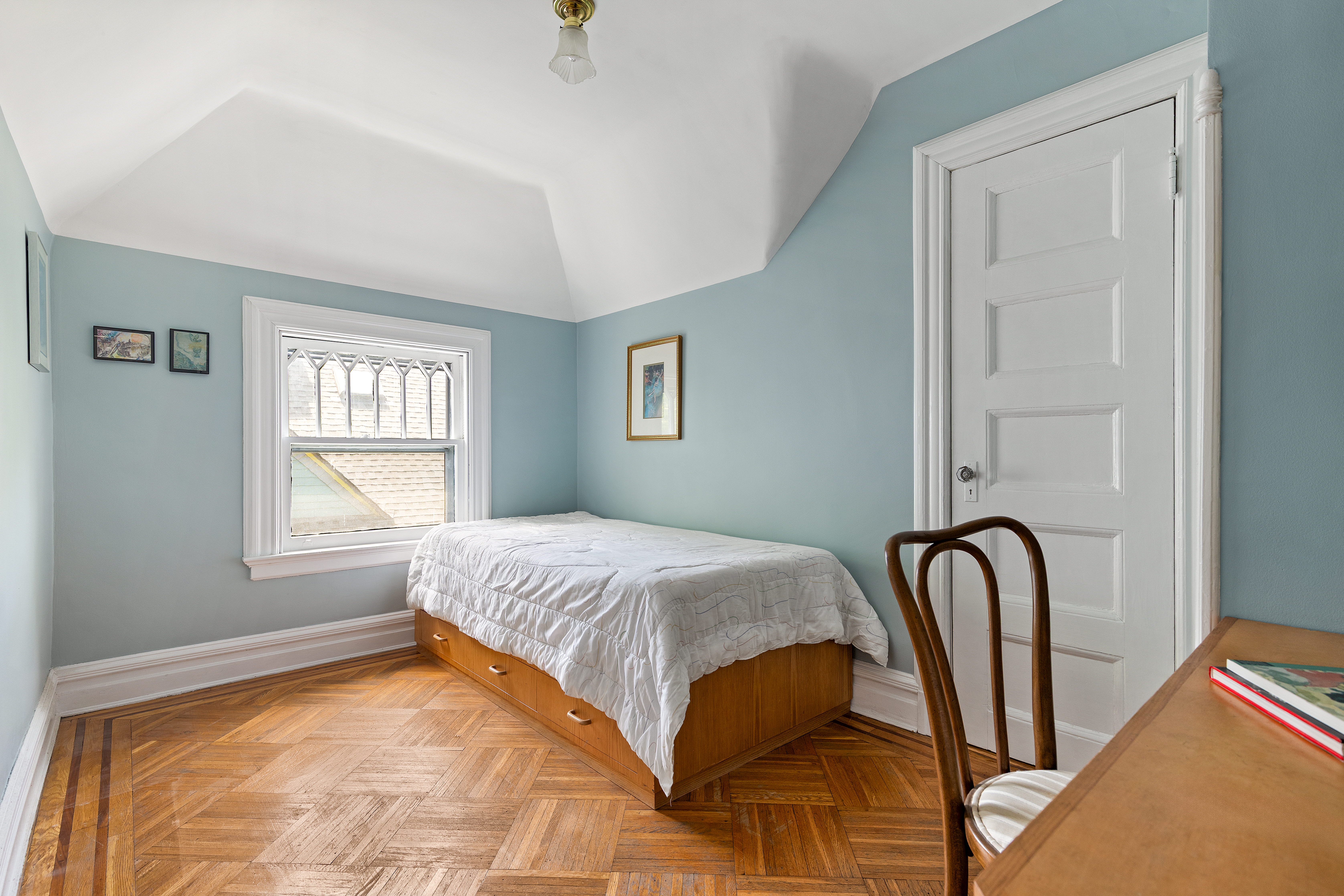 492 Westminster Road Brooklyn, NY 11218 - Photo 14 of 21 a bedroom with a bed and dresser with window